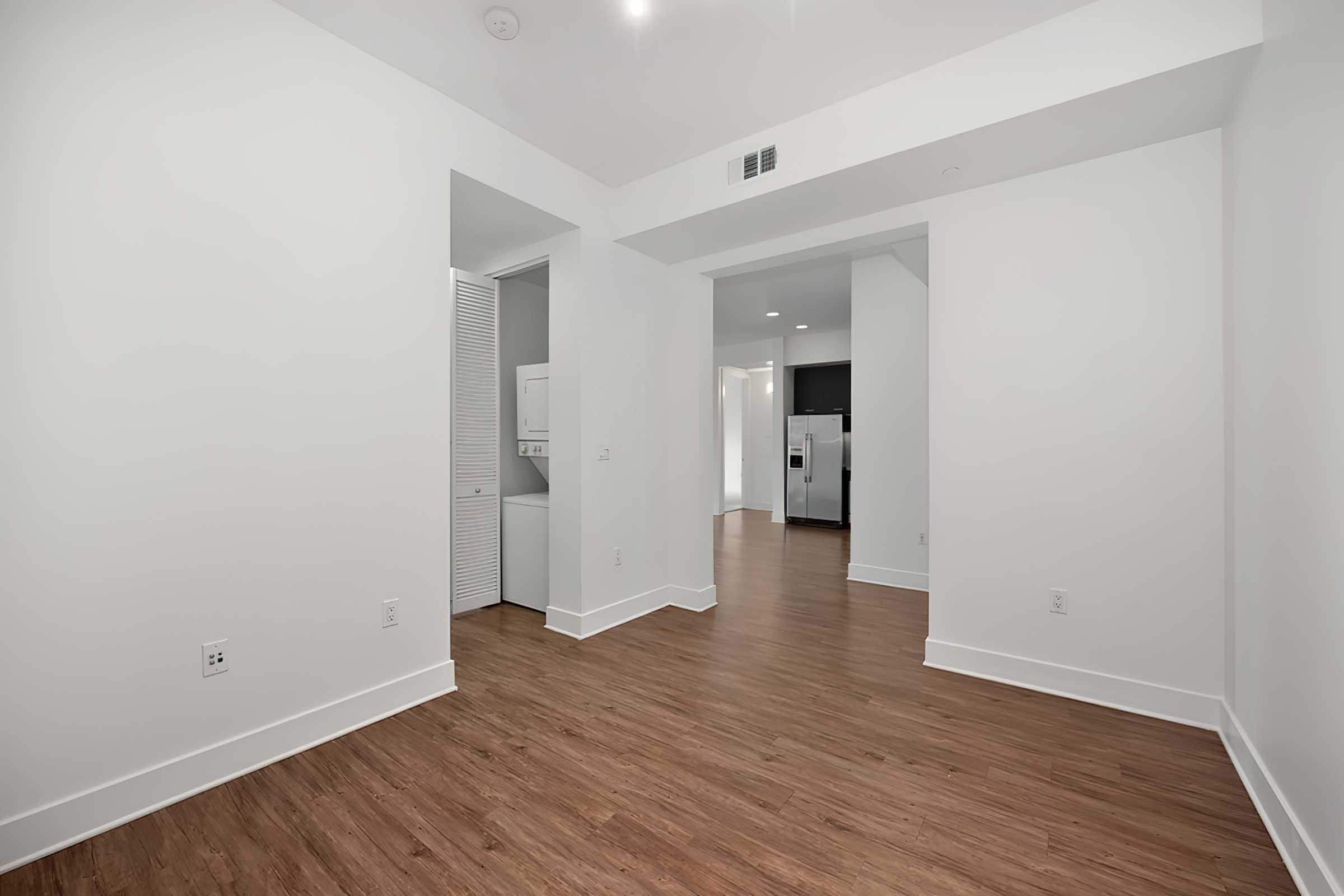 a large room with a washer dryer