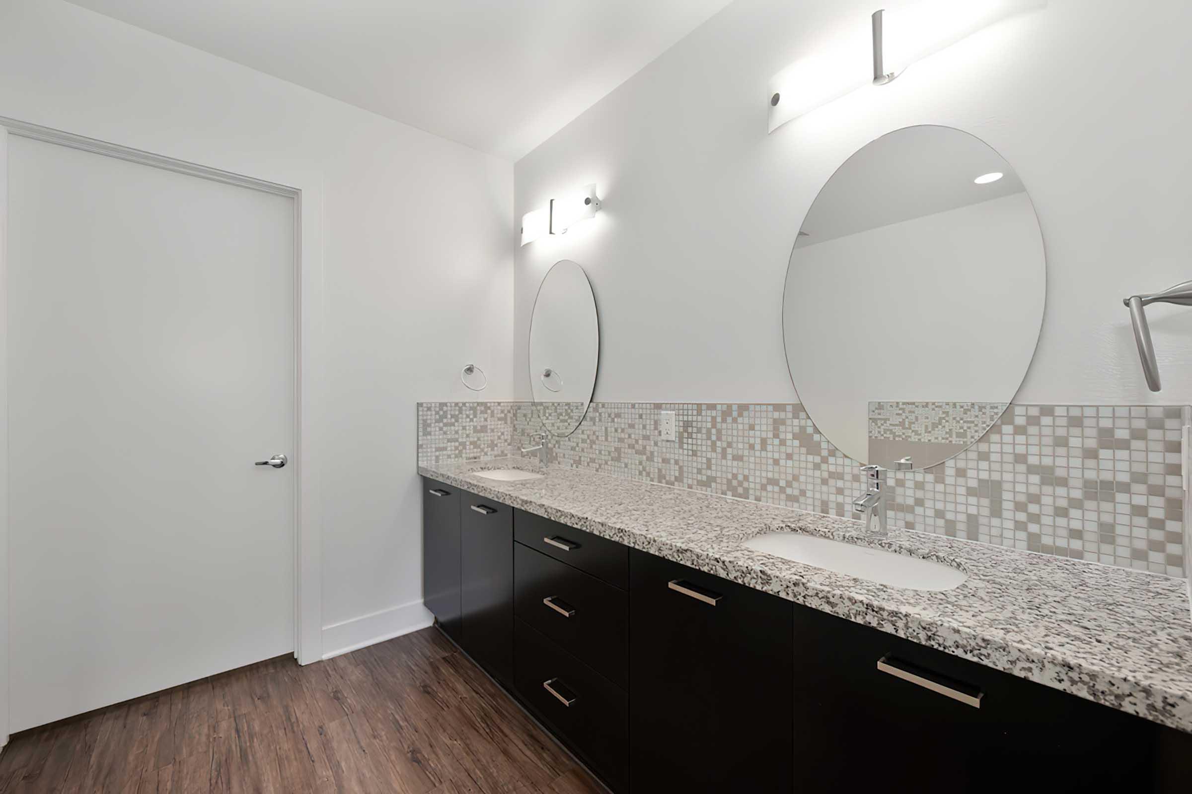 a bathroom with a double vanity