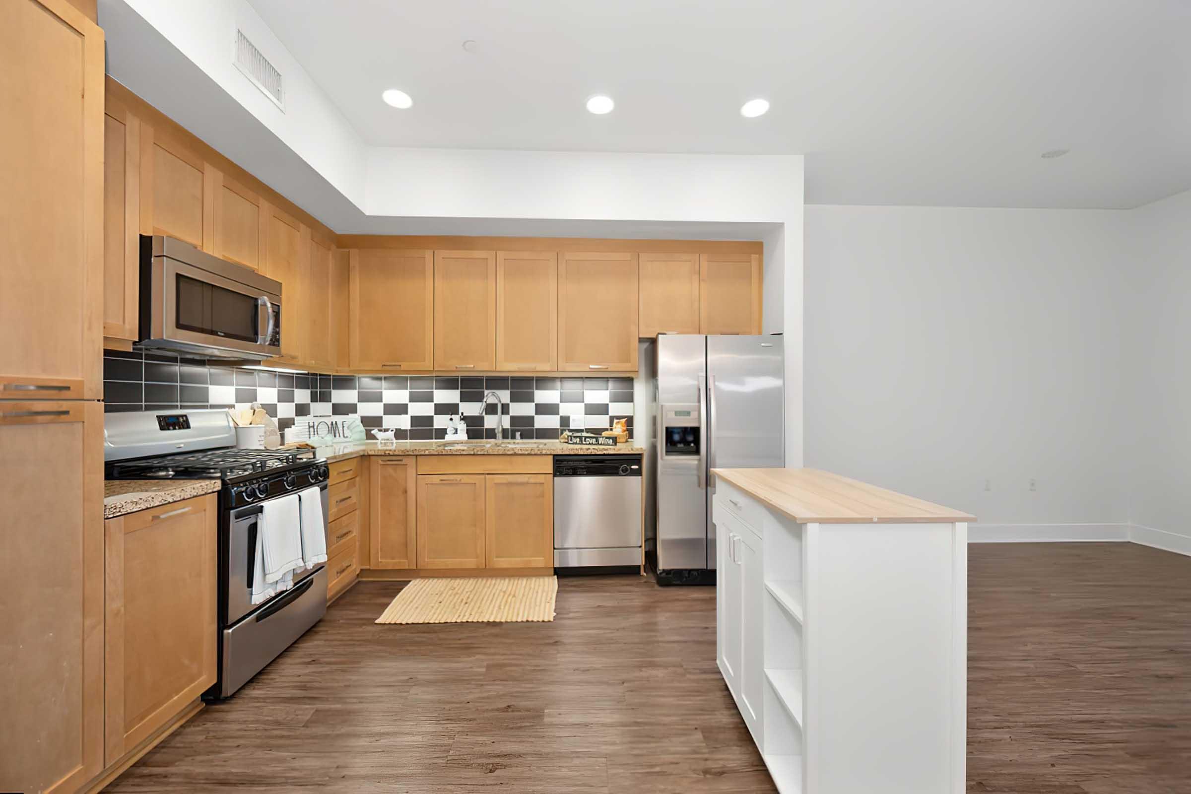 a kitchen with a wood cabinets