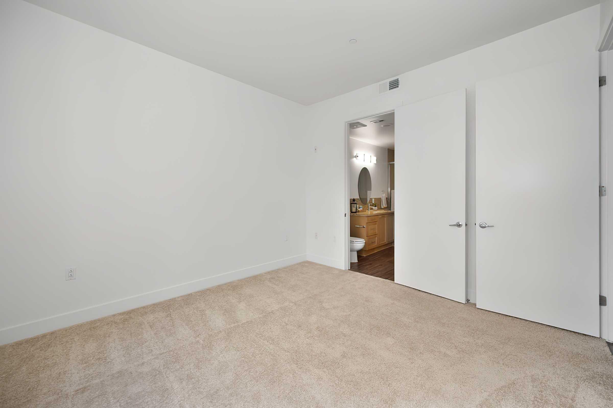 a bedroom with carpeting