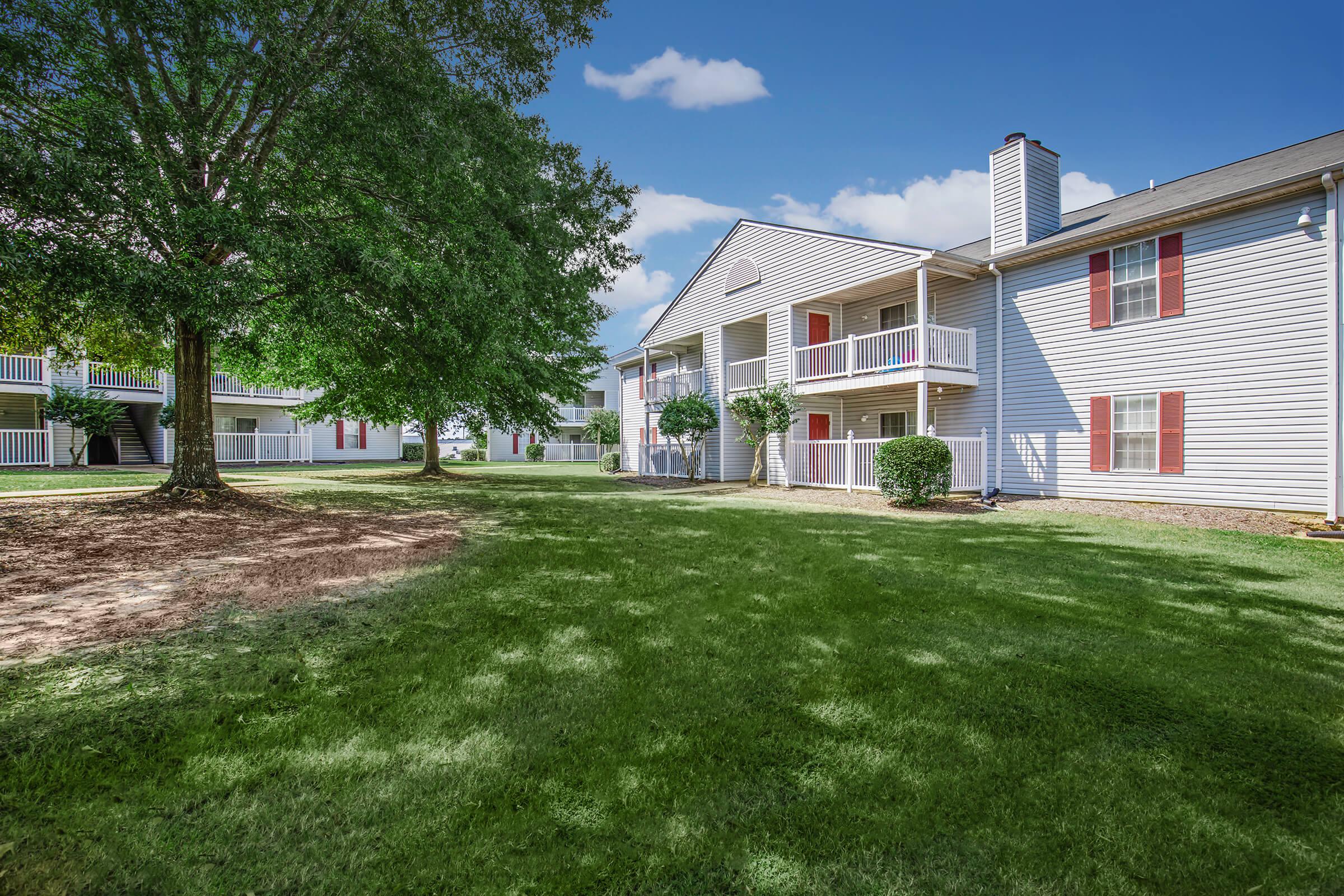 a large lawn in front of a house