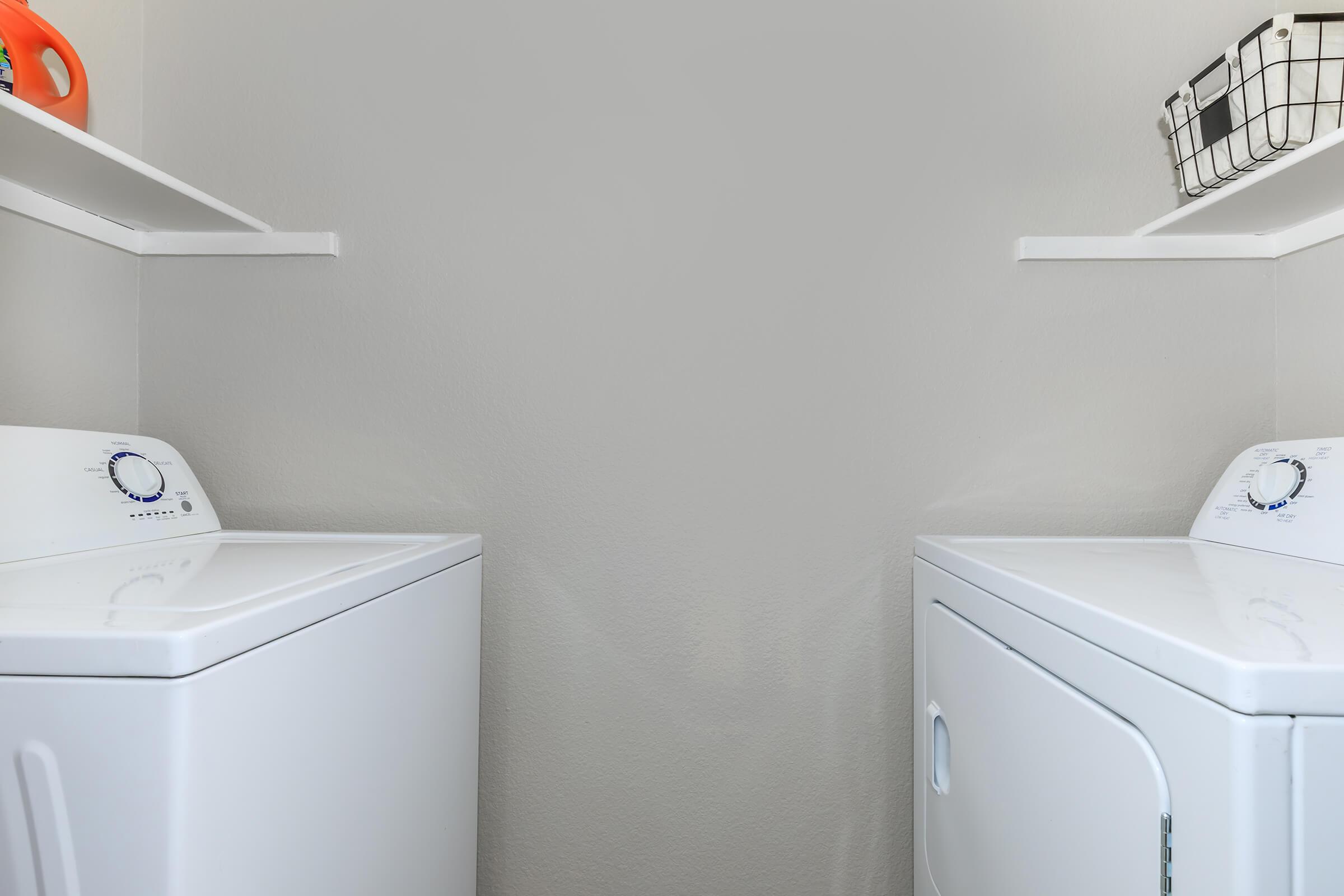 a white refrigerator freezer sitting in a box