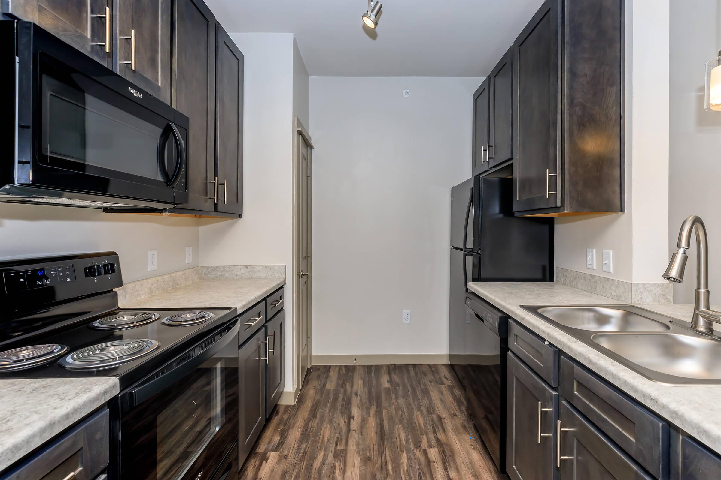 a modern kitchen with stainless steel appliances