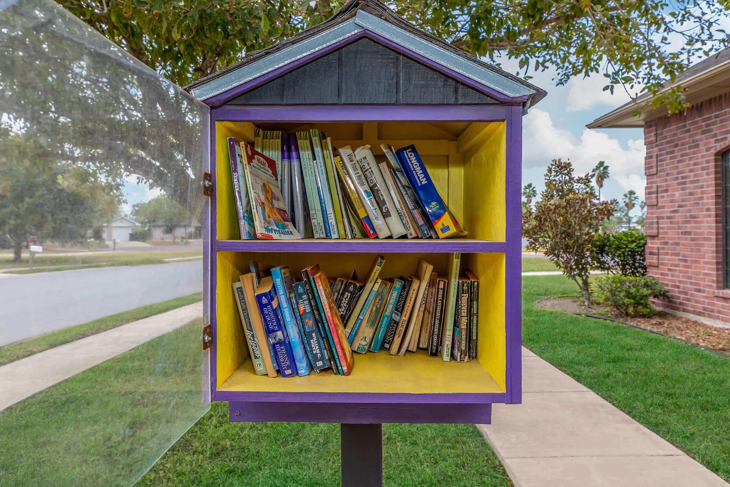 a book on a bench in front of a building