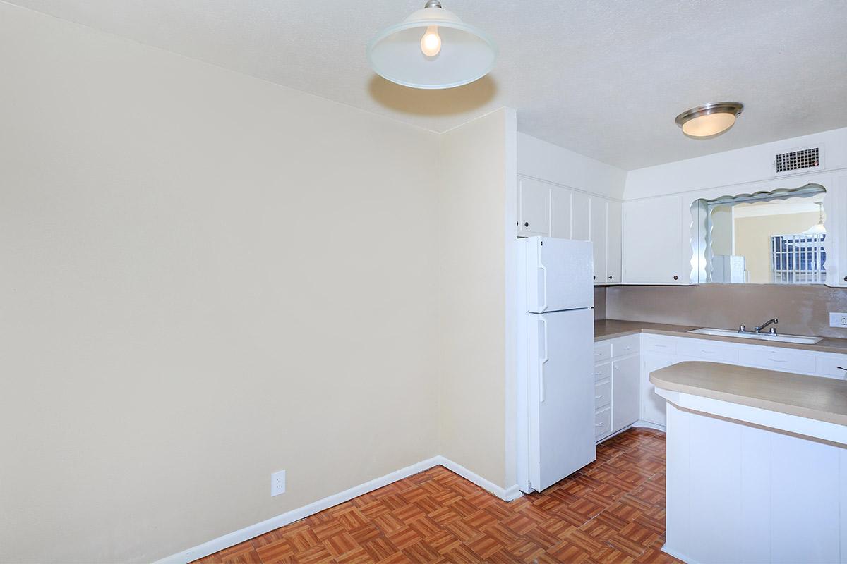 a kitchen with a sink and a microwave