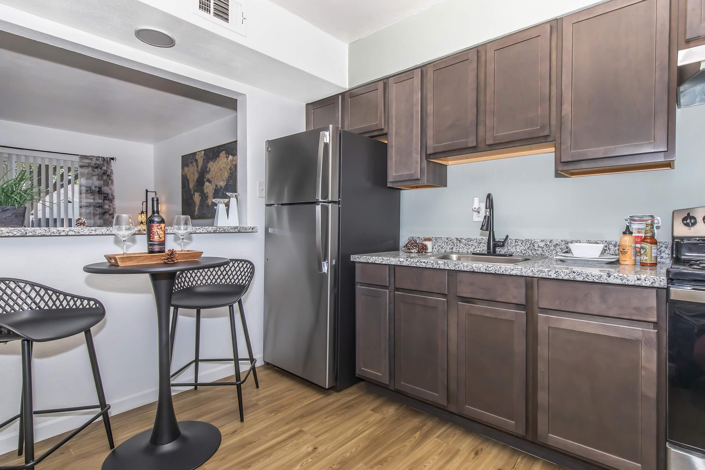 a modern kitchen with stainless steel appliances