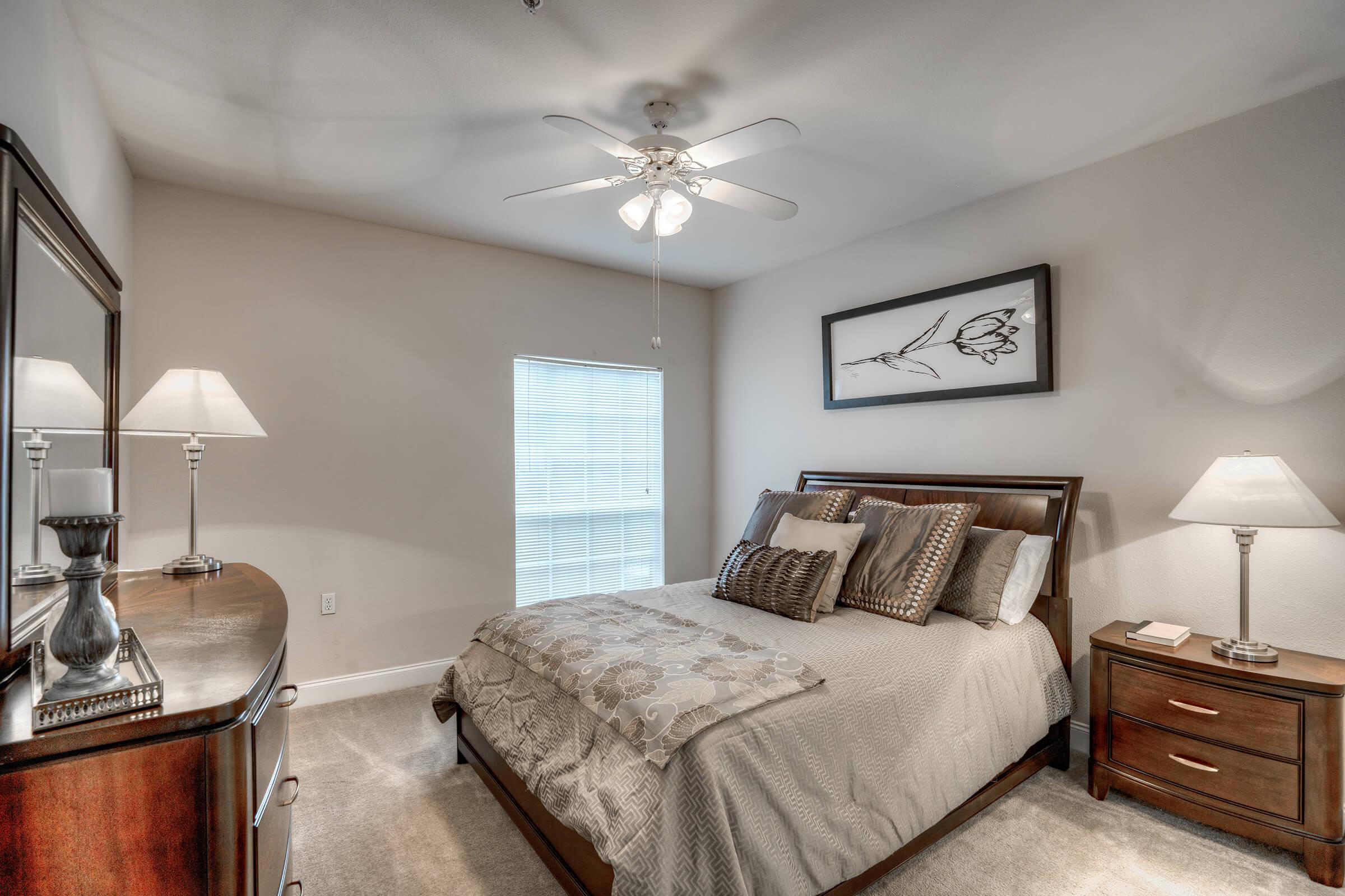 a bedroom with a bed in a hotel room