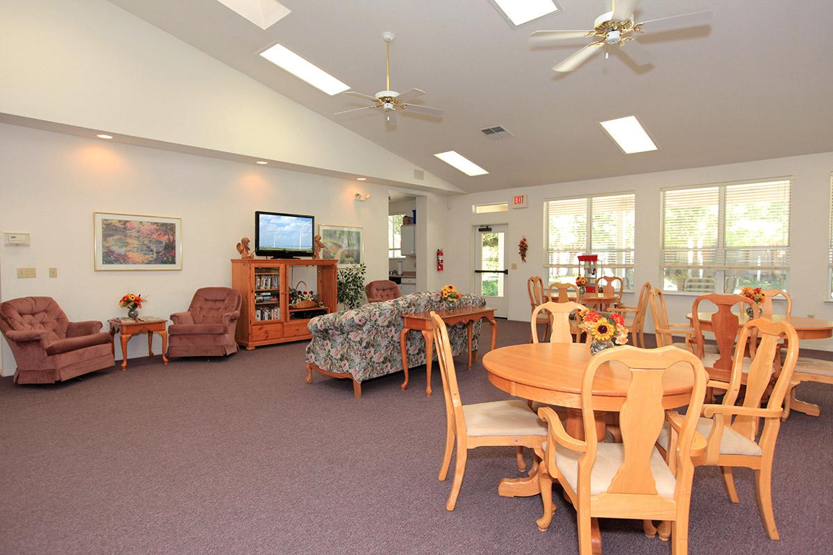 a room filled with furniture and a table