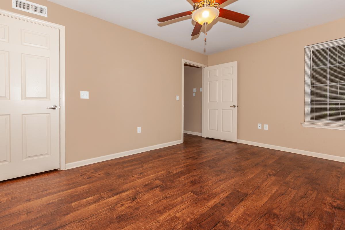 a kitchen with a wood floor