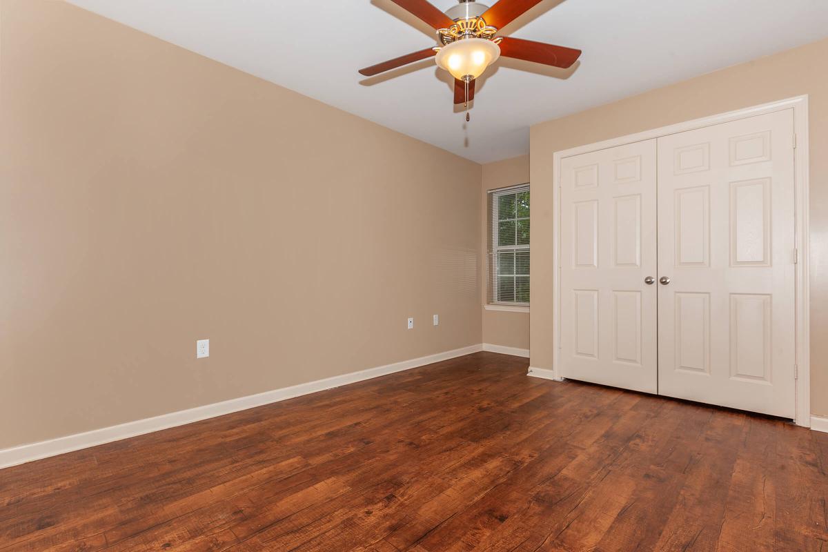 a kitchen with a wood floor