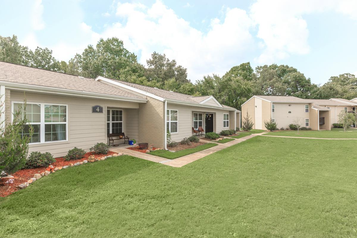 a large lawn in front of a house