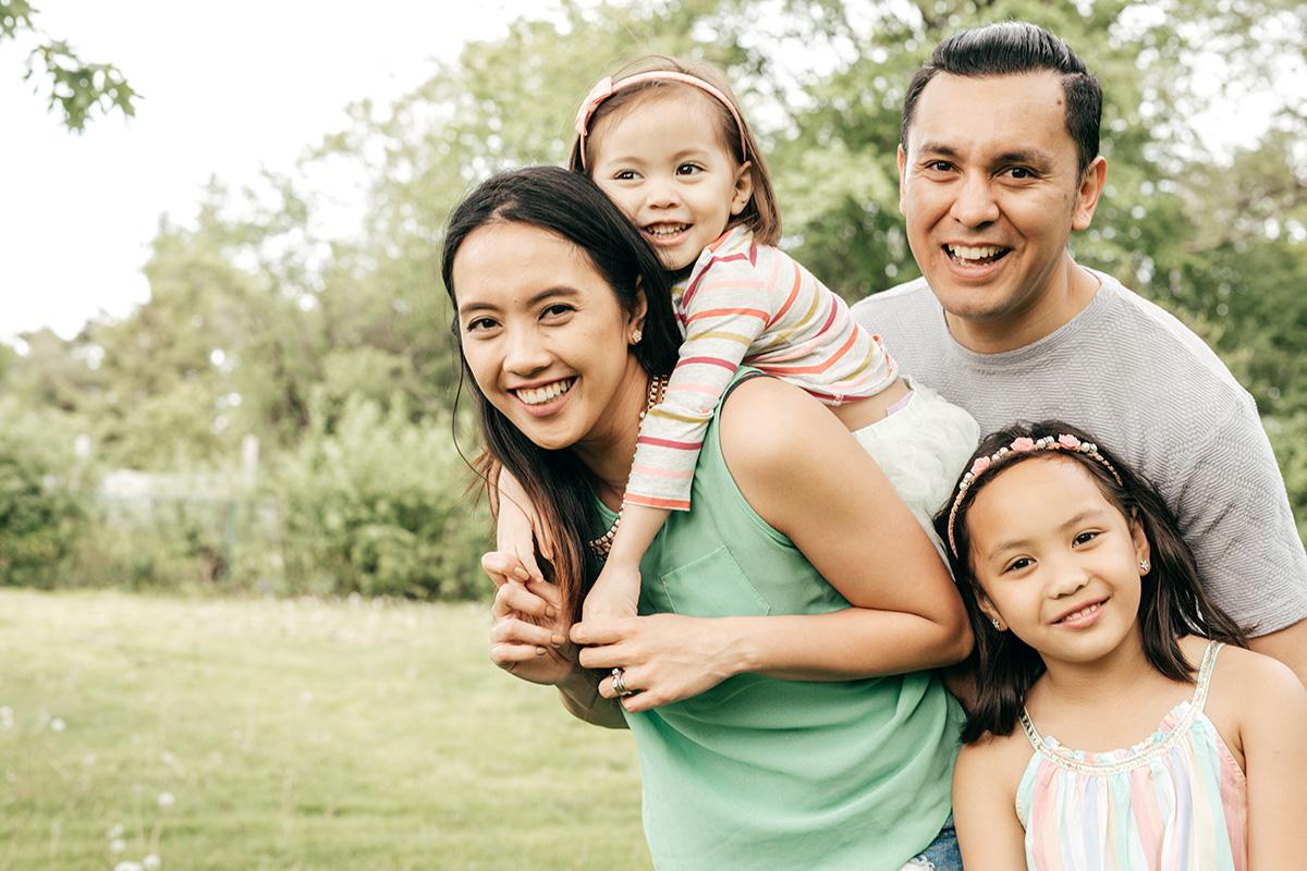 Happy family having fun outdoor iStock-693915920.jpg