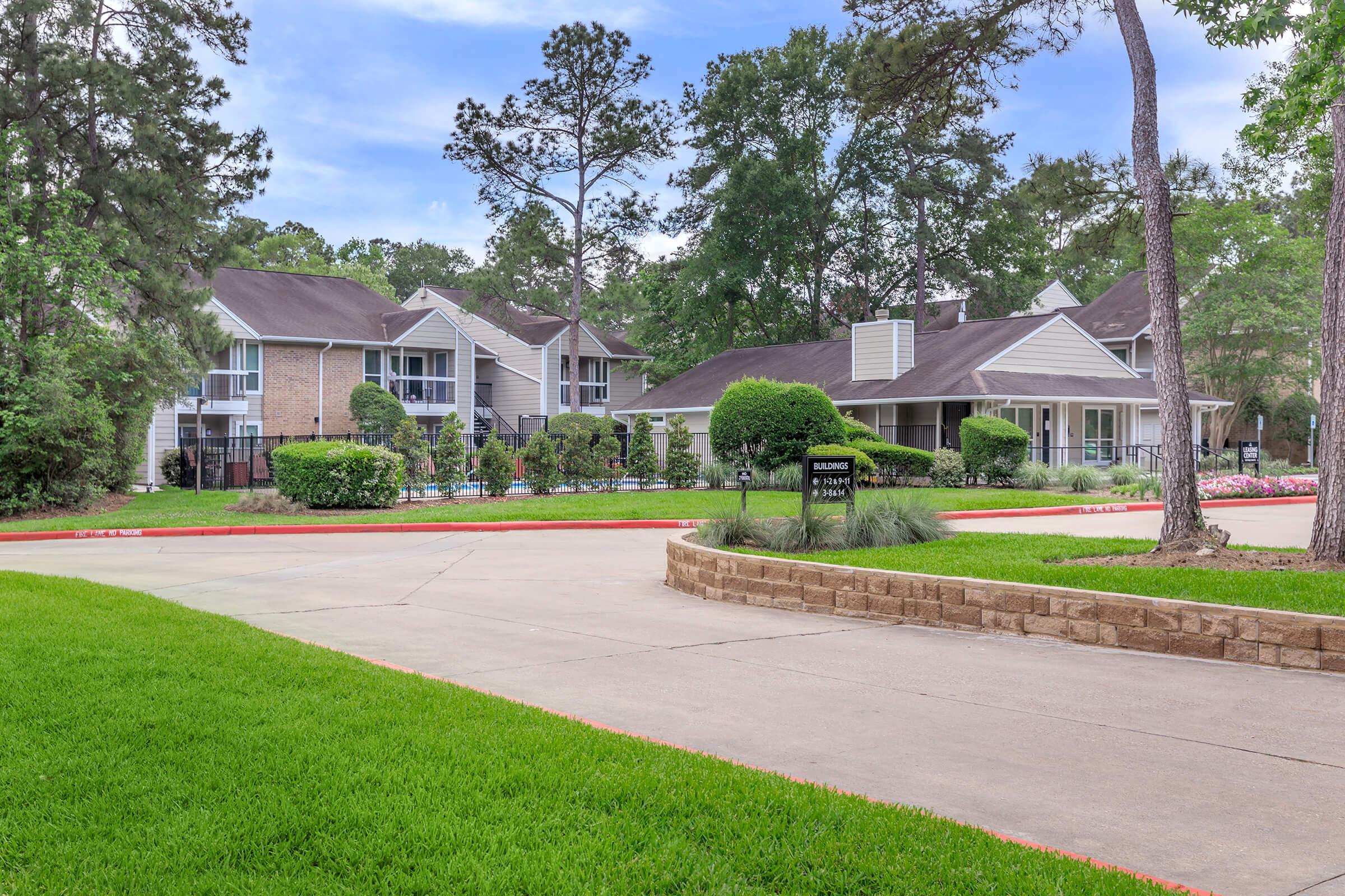 a large lawn in front of a house