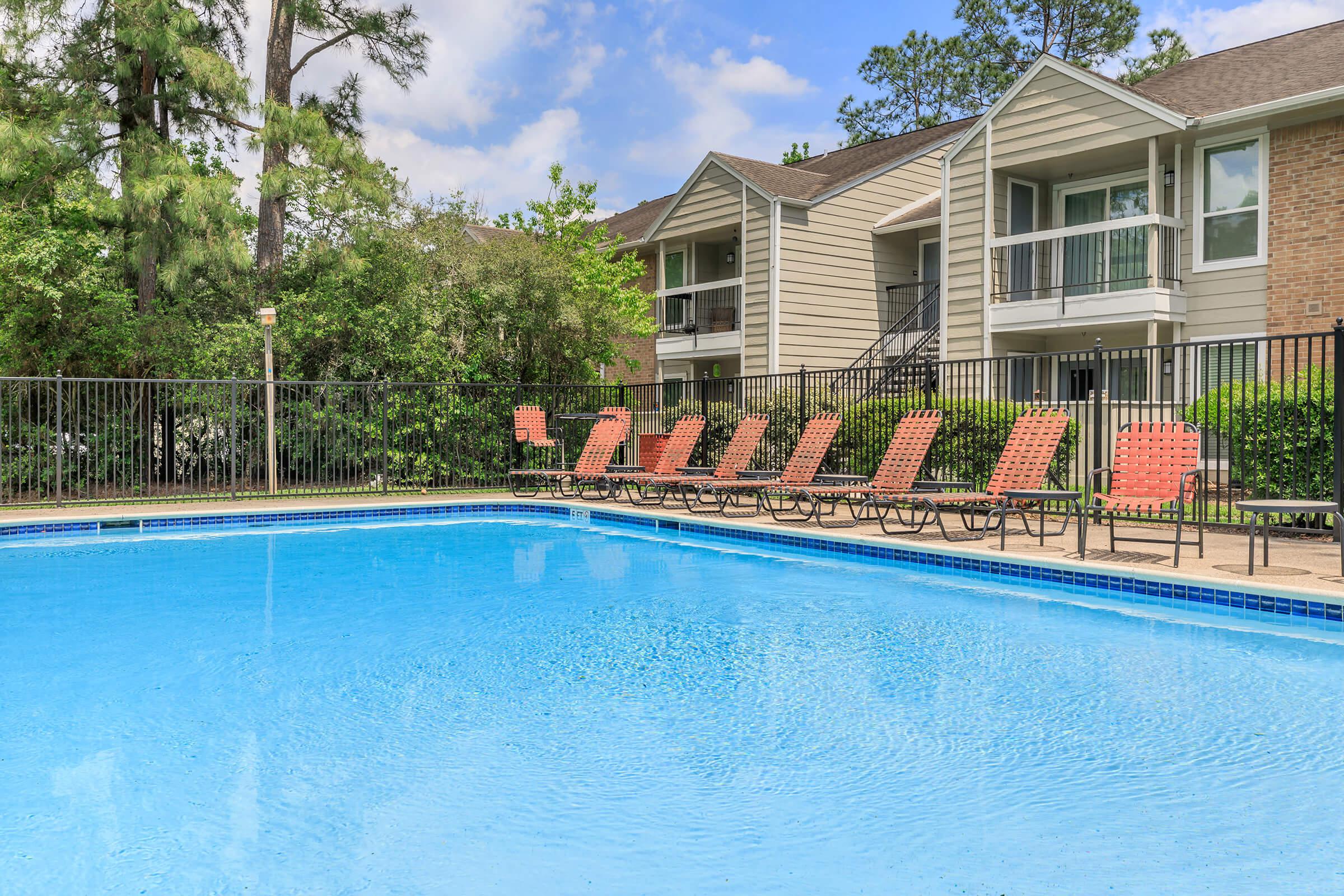 a house with a large pool of water