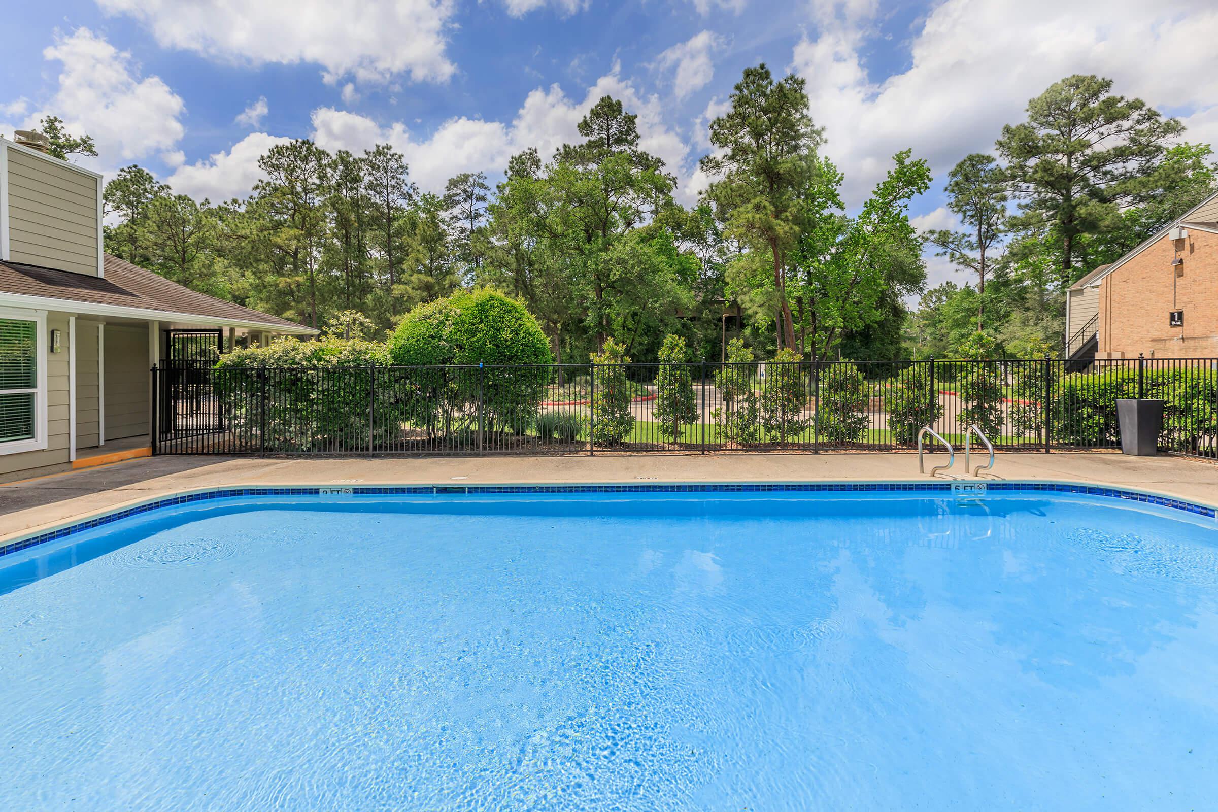 a pool next to a body of water