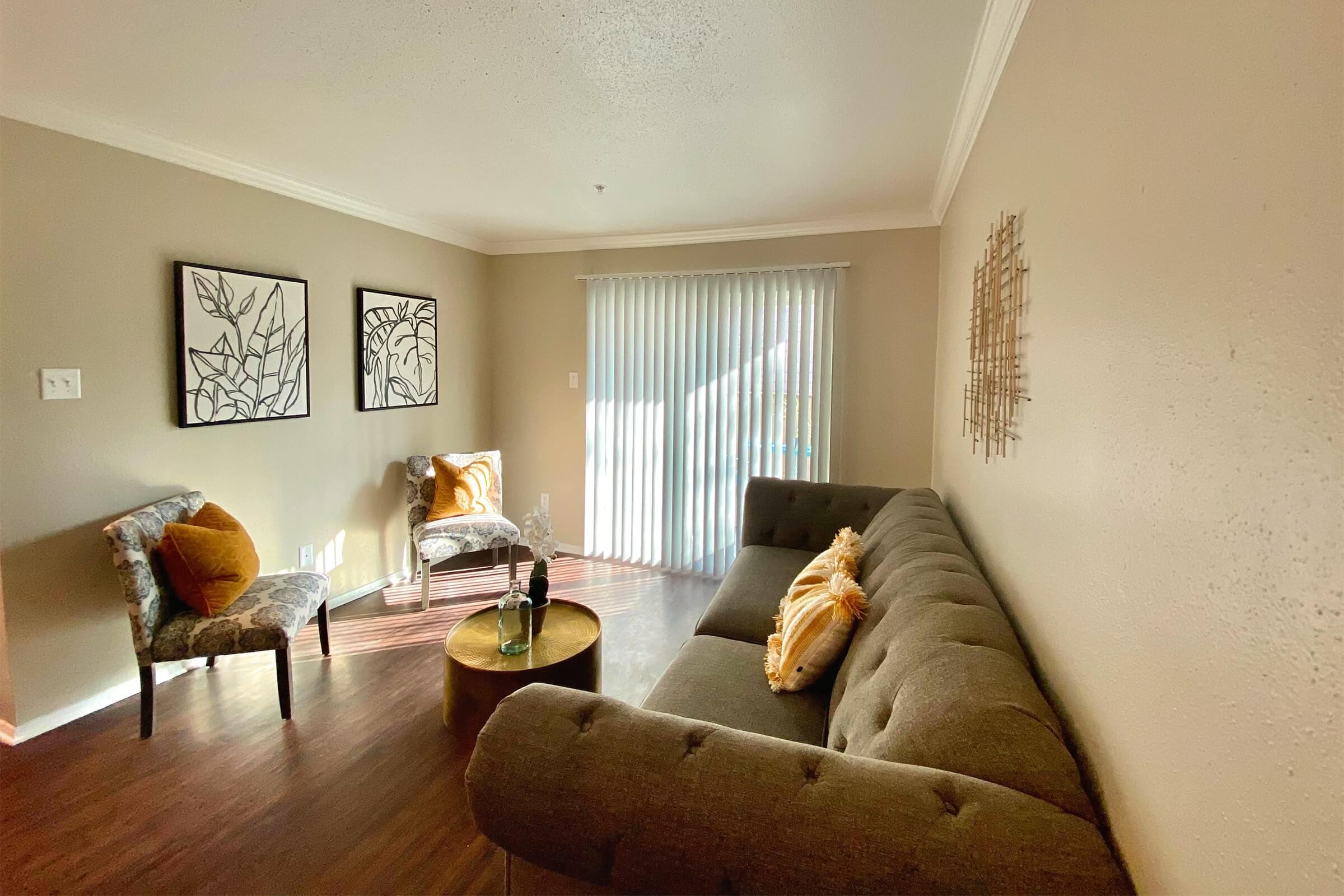 a living room filled with furniture and a fire place