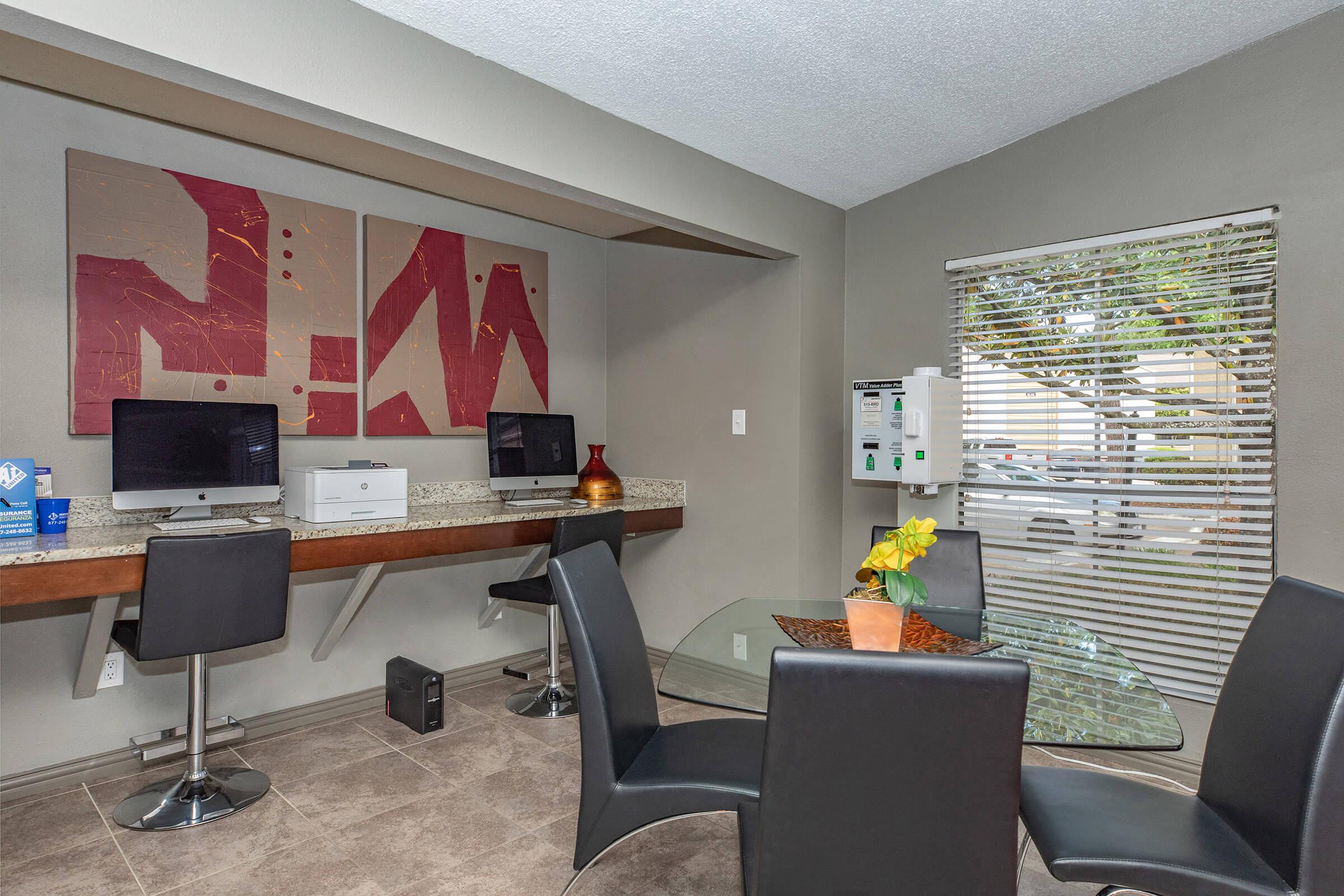 a living room filled with furniture and a flat screen tv