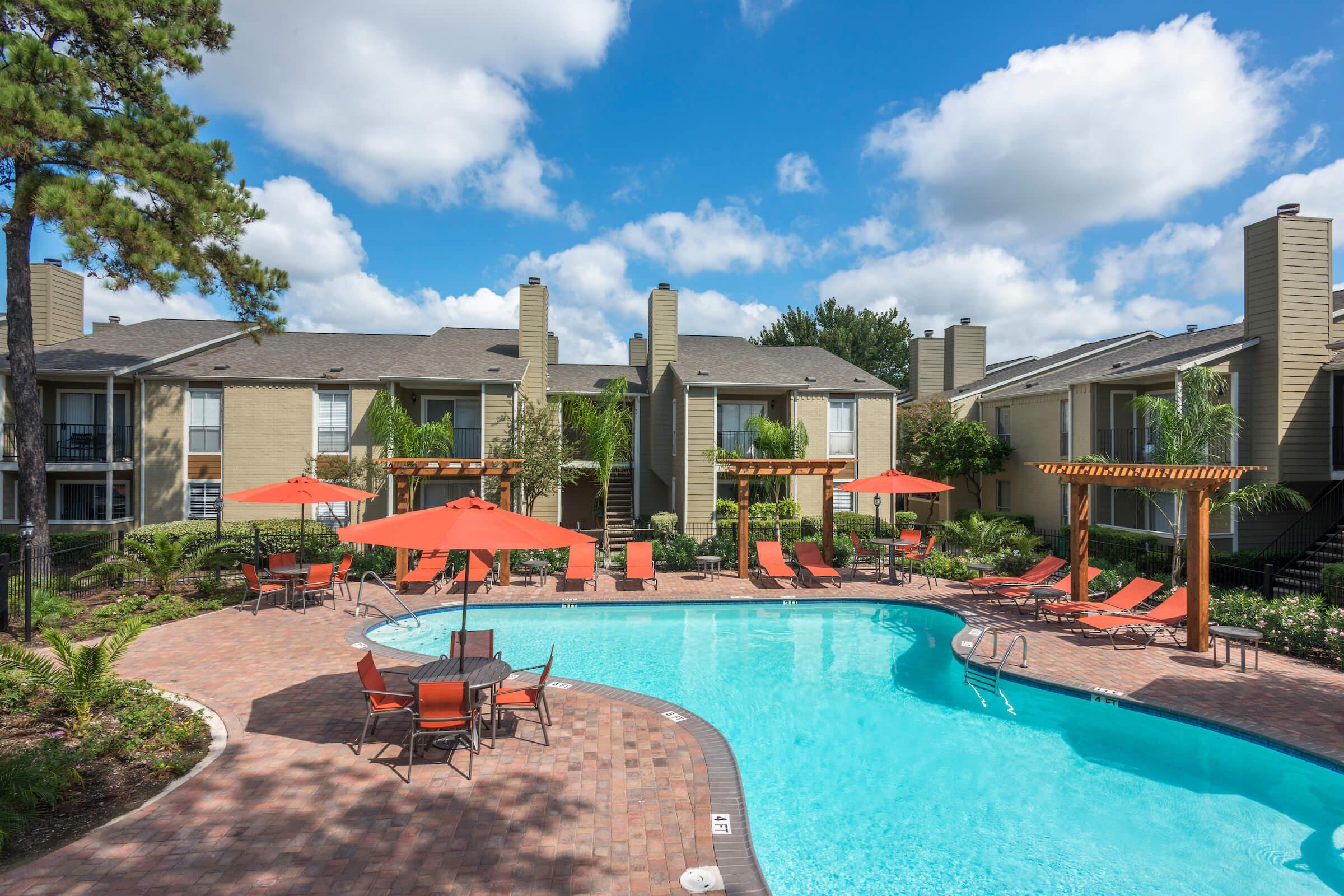 a pool in front of a building