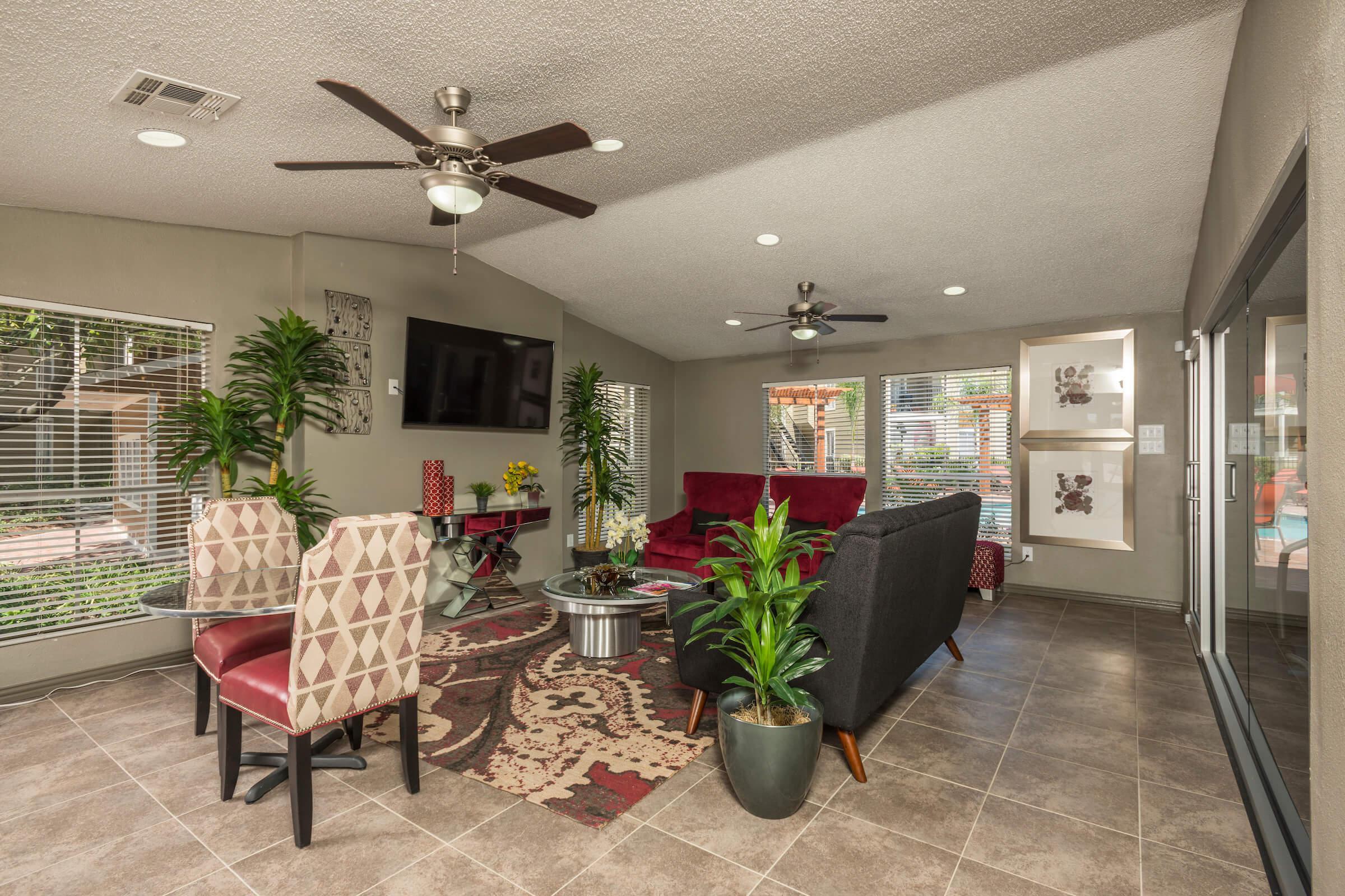 a living room filled with furniture and a fire place