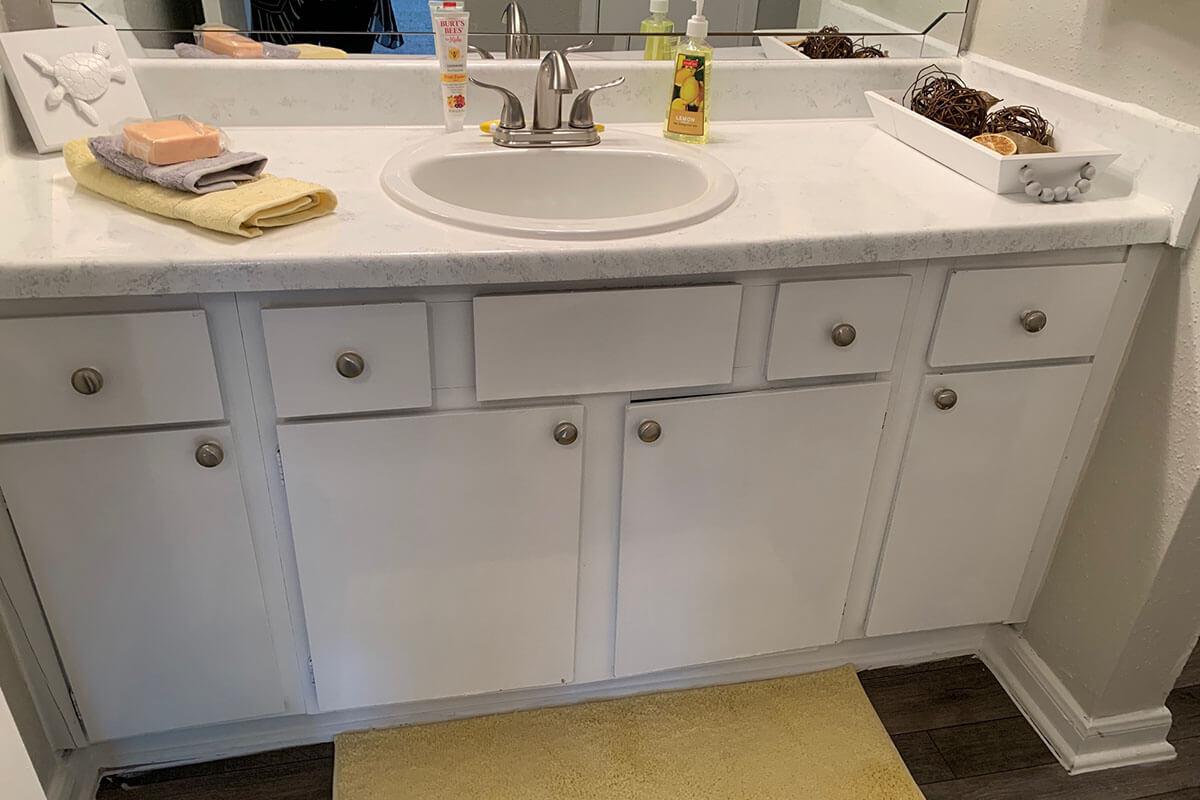 a kitchen with a sink and a counter