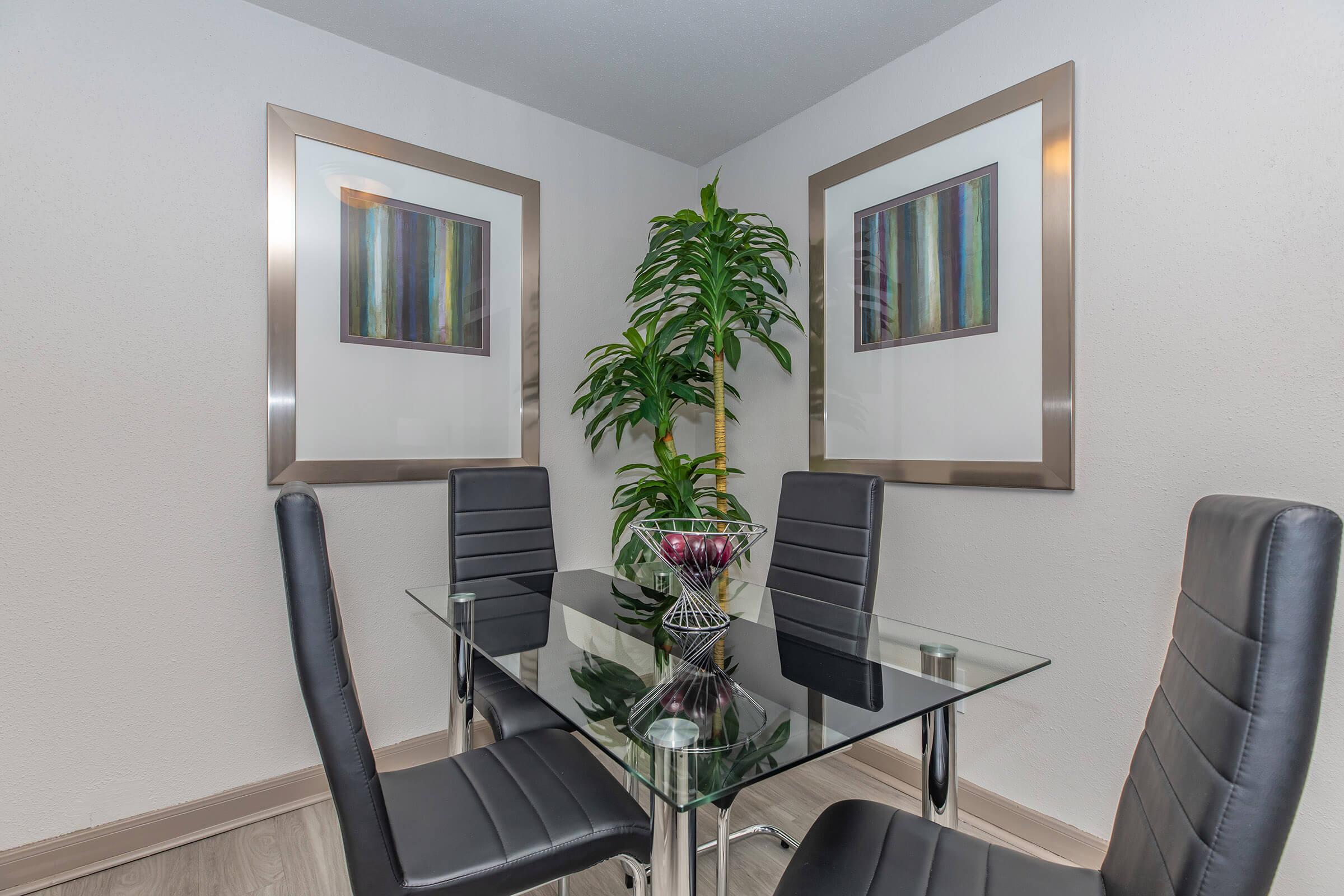 a living room with a leather chair