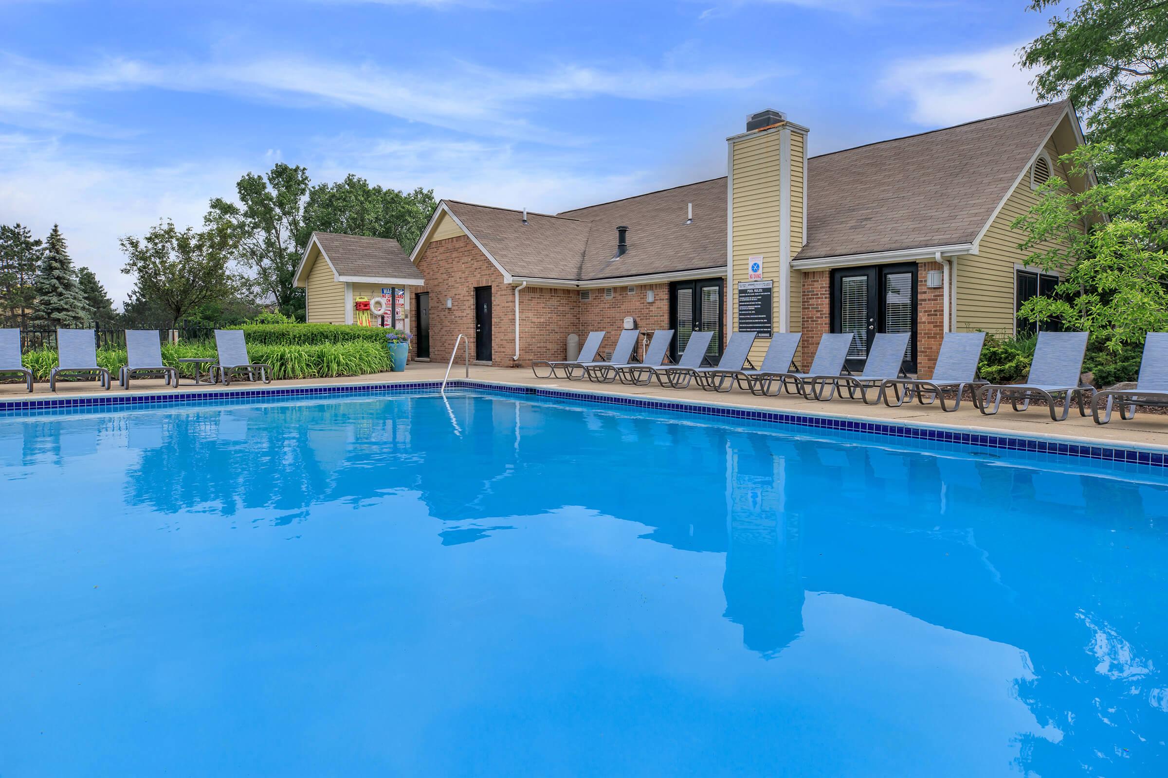 a house with a large pool of water