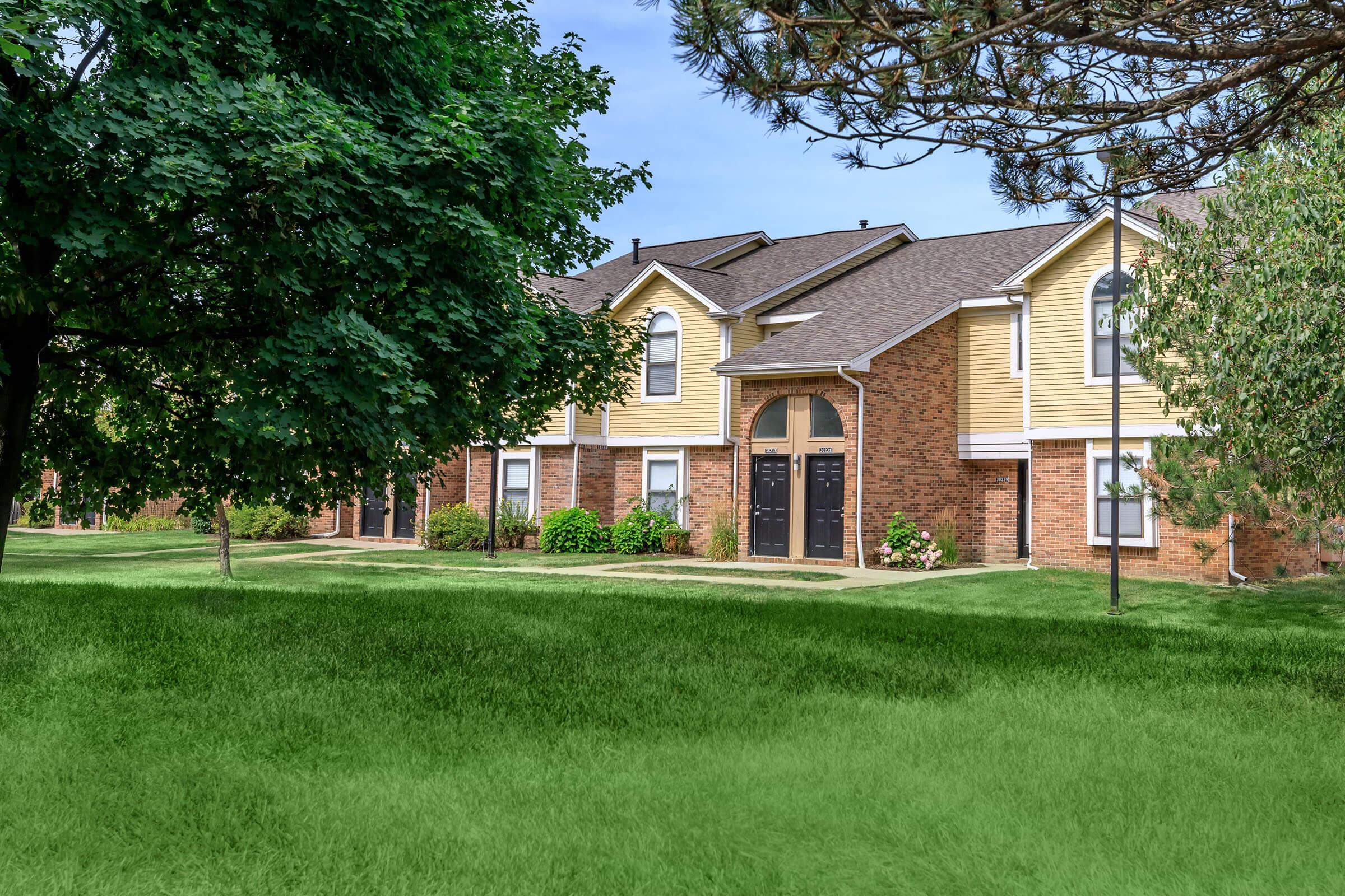 a large lawn in front of a house