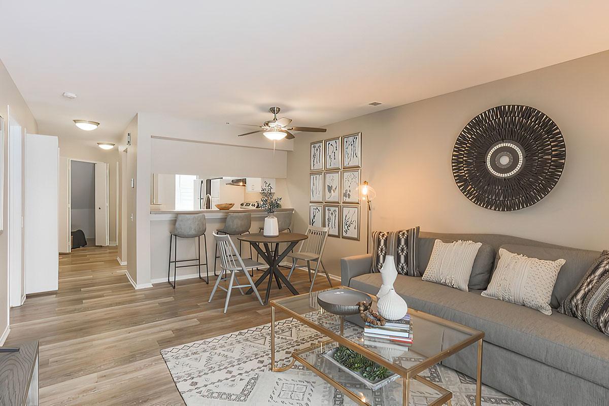 a living room filled with furniture and a fireplace