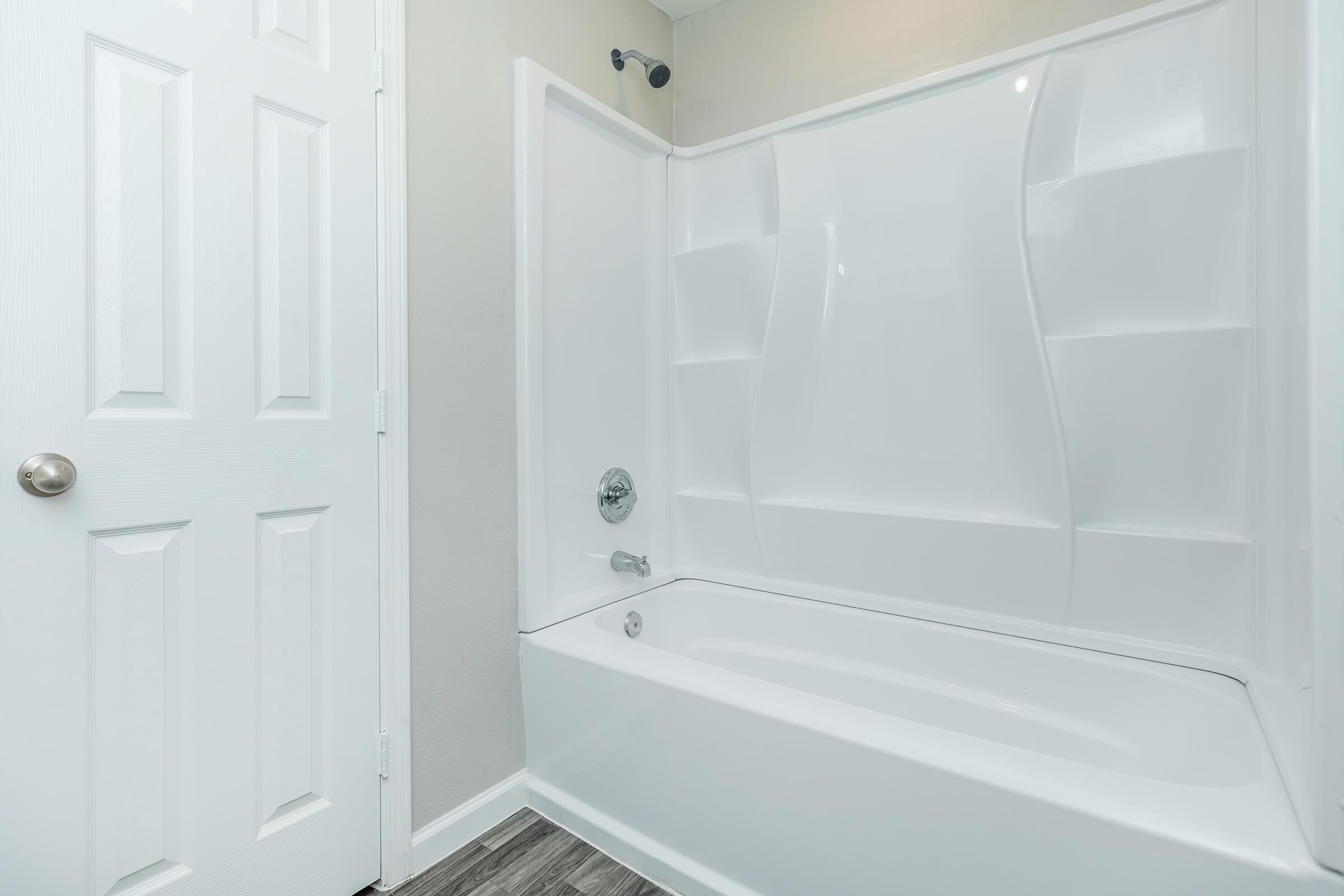 a close up of a shower in a small room