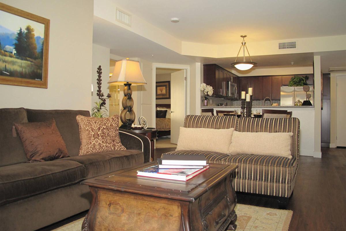 a living room filled with furniture and a fire place