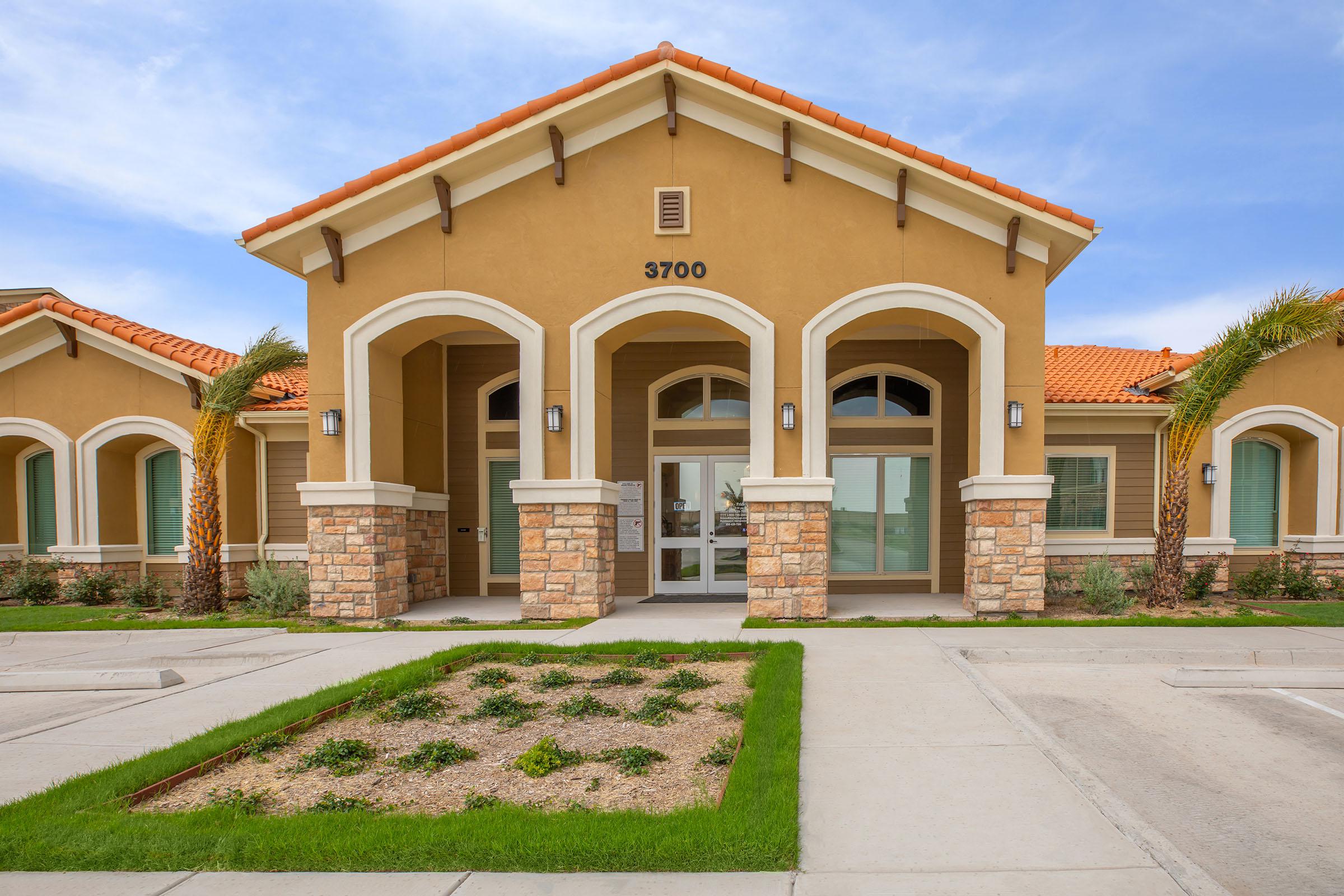 a large lawn in front of a house