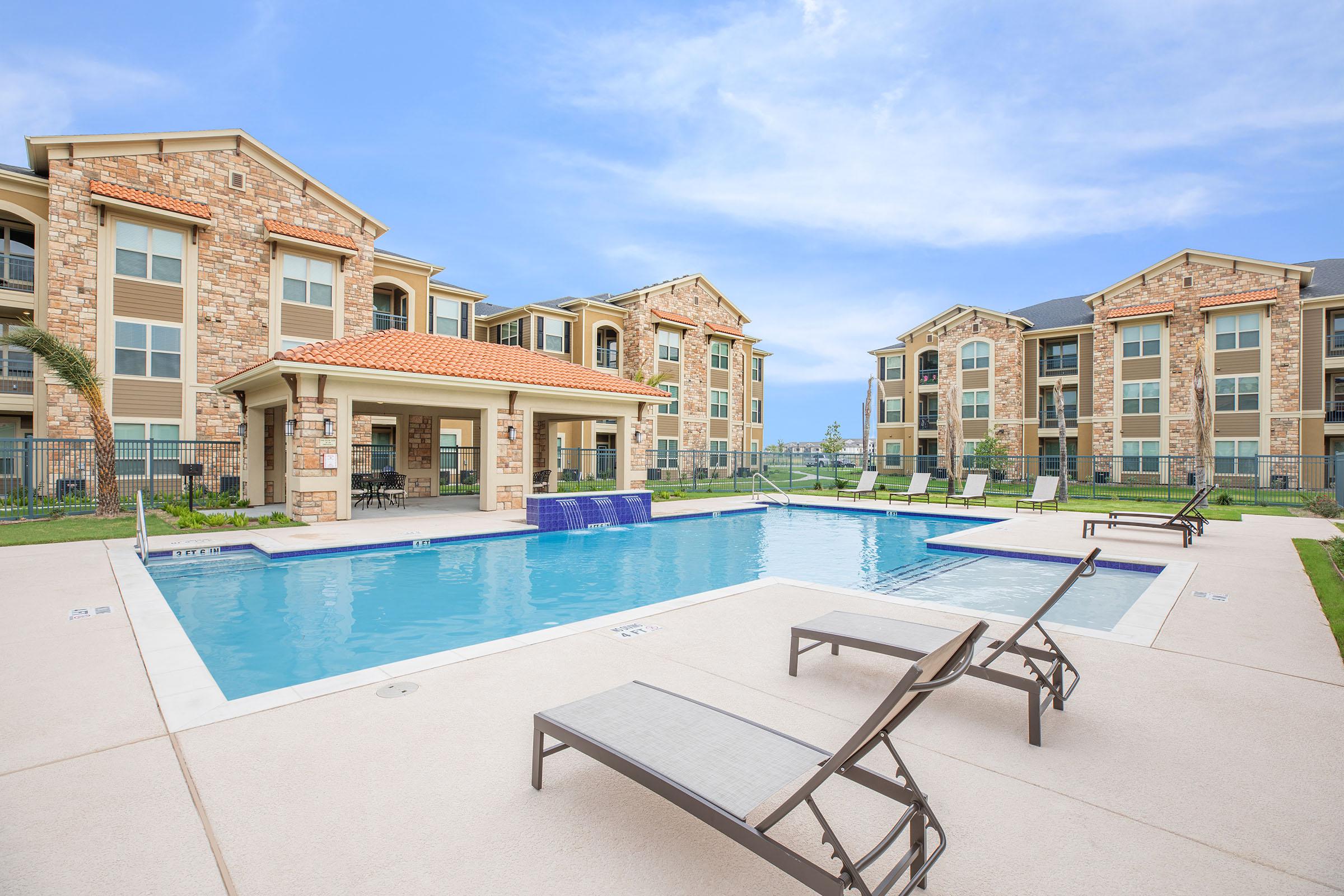 a pool in front of a building