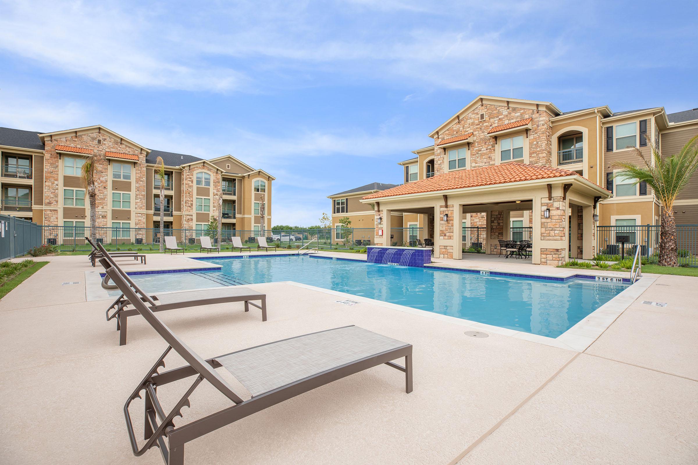 a pool next to a building