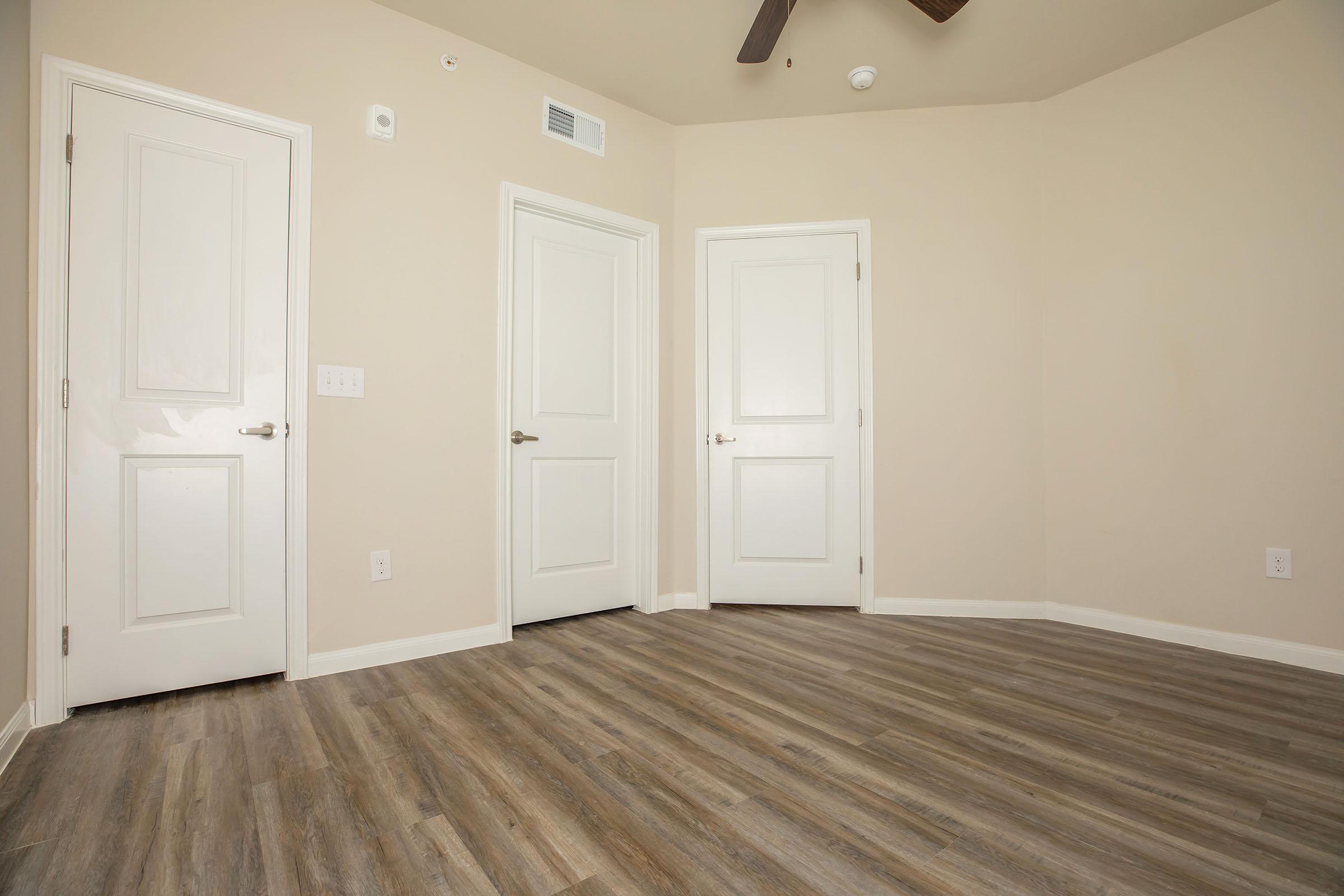 a wooden door in a room