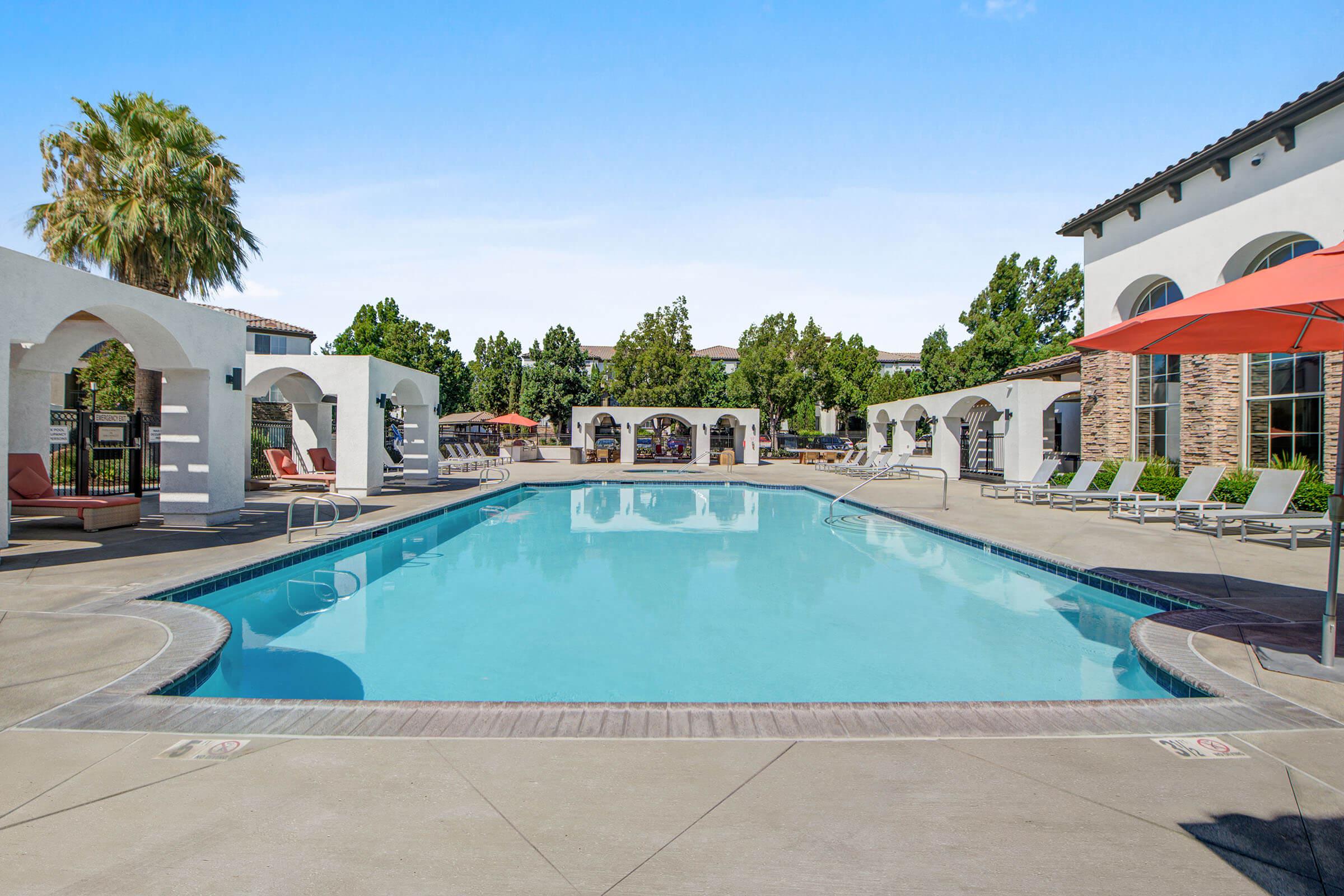 a pool next to a building