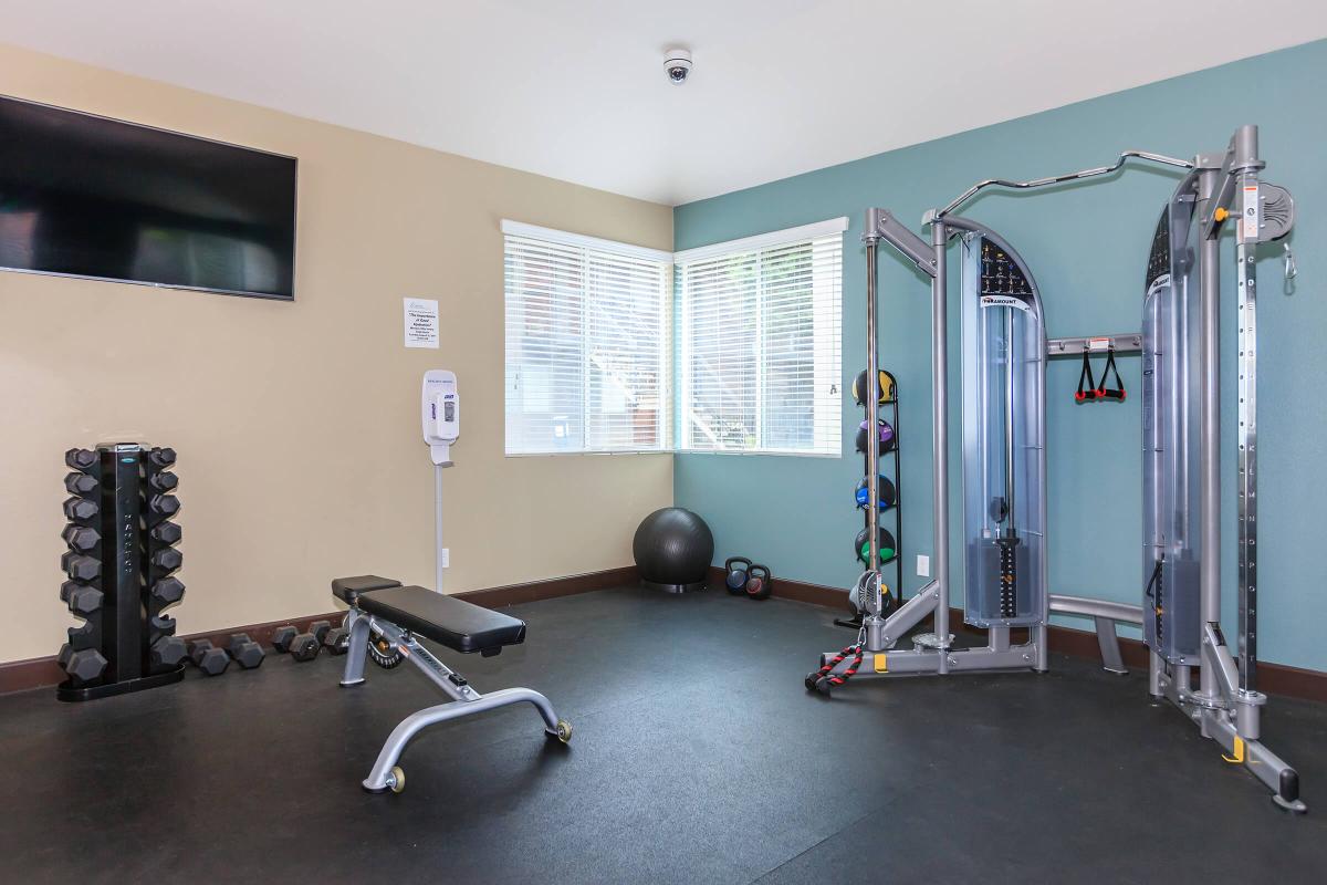 a room filled with furniture and a large window