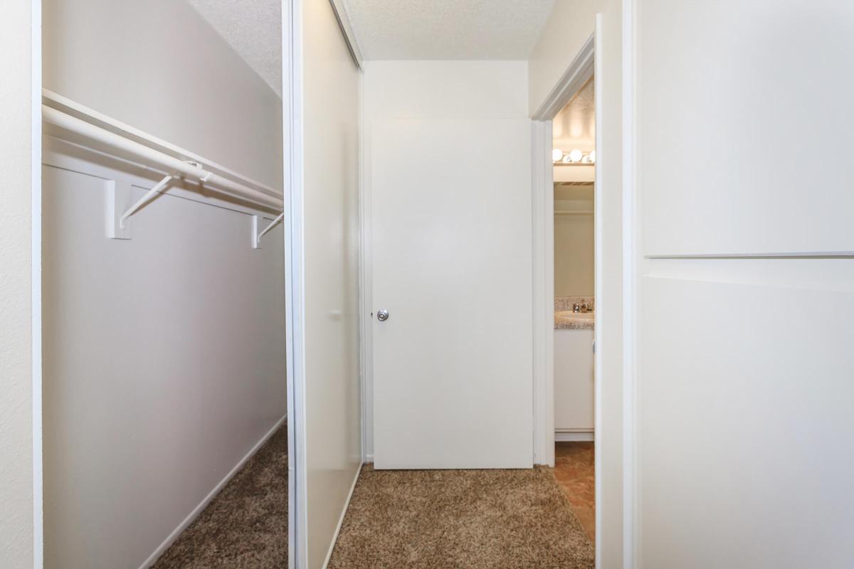 a white refrigerator freezer sitting in a room