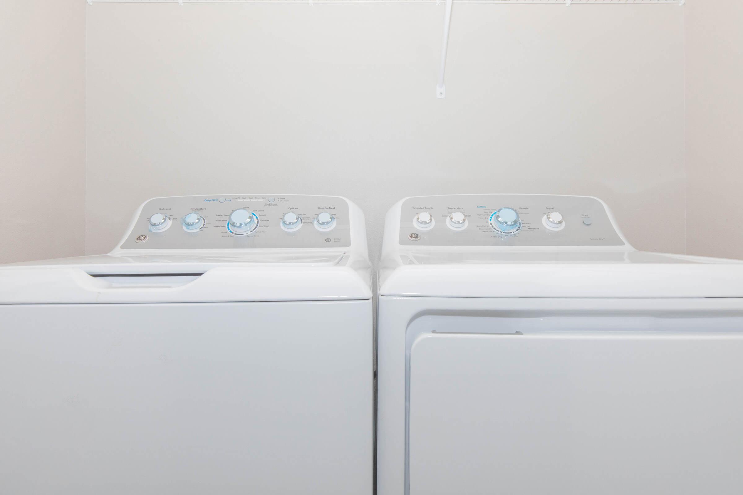 a stove top oven sitting inside of a refrigerator