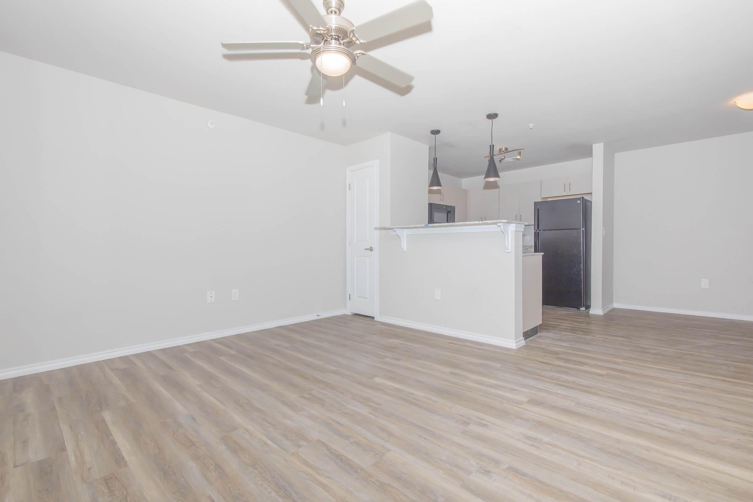 a kitchen with a wood floor