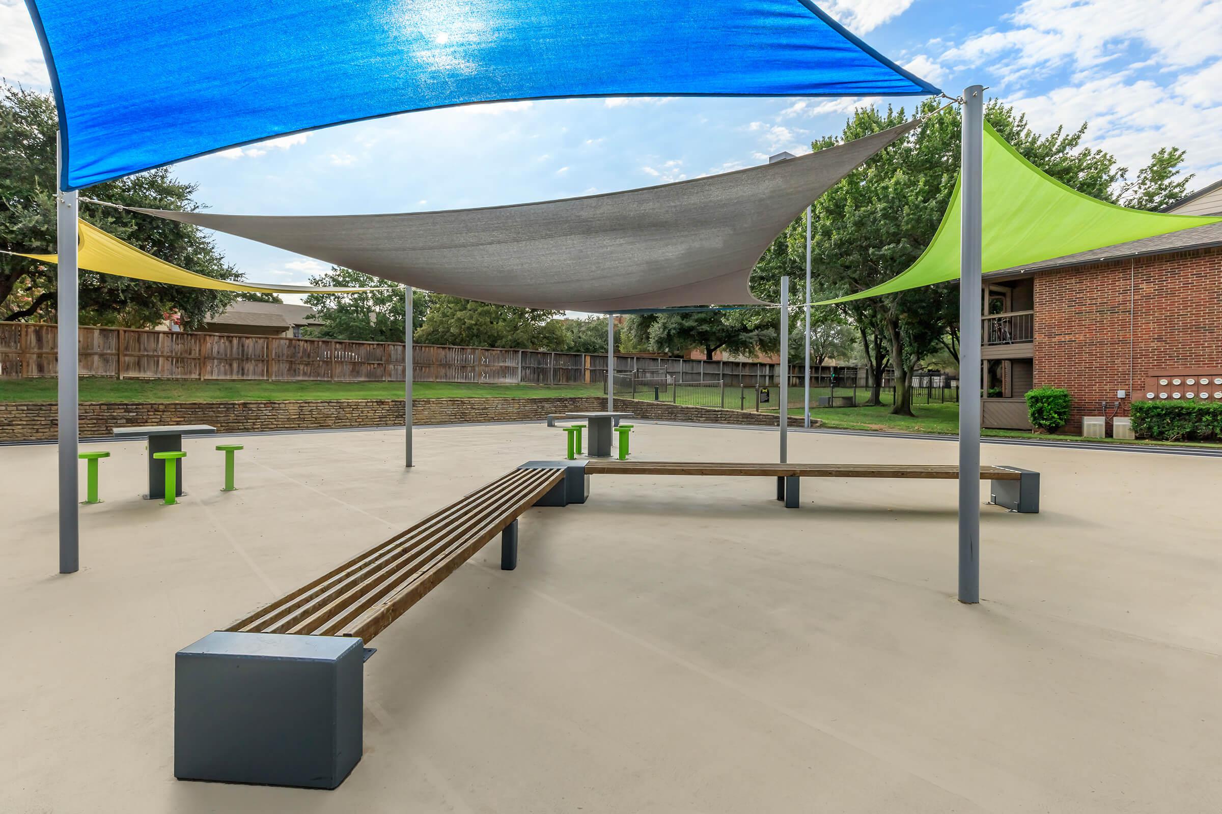 Oak Chase community area with wooden benches