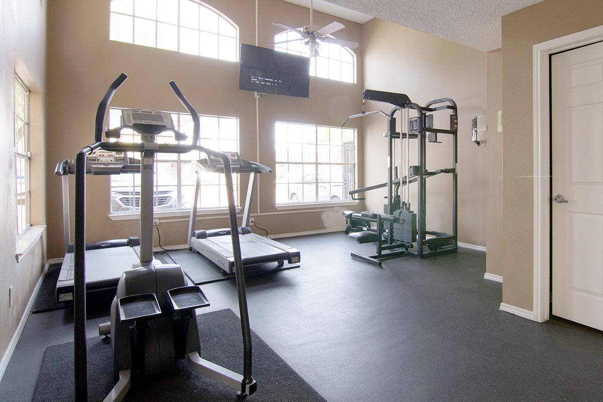 a room filled with furniture and a large window