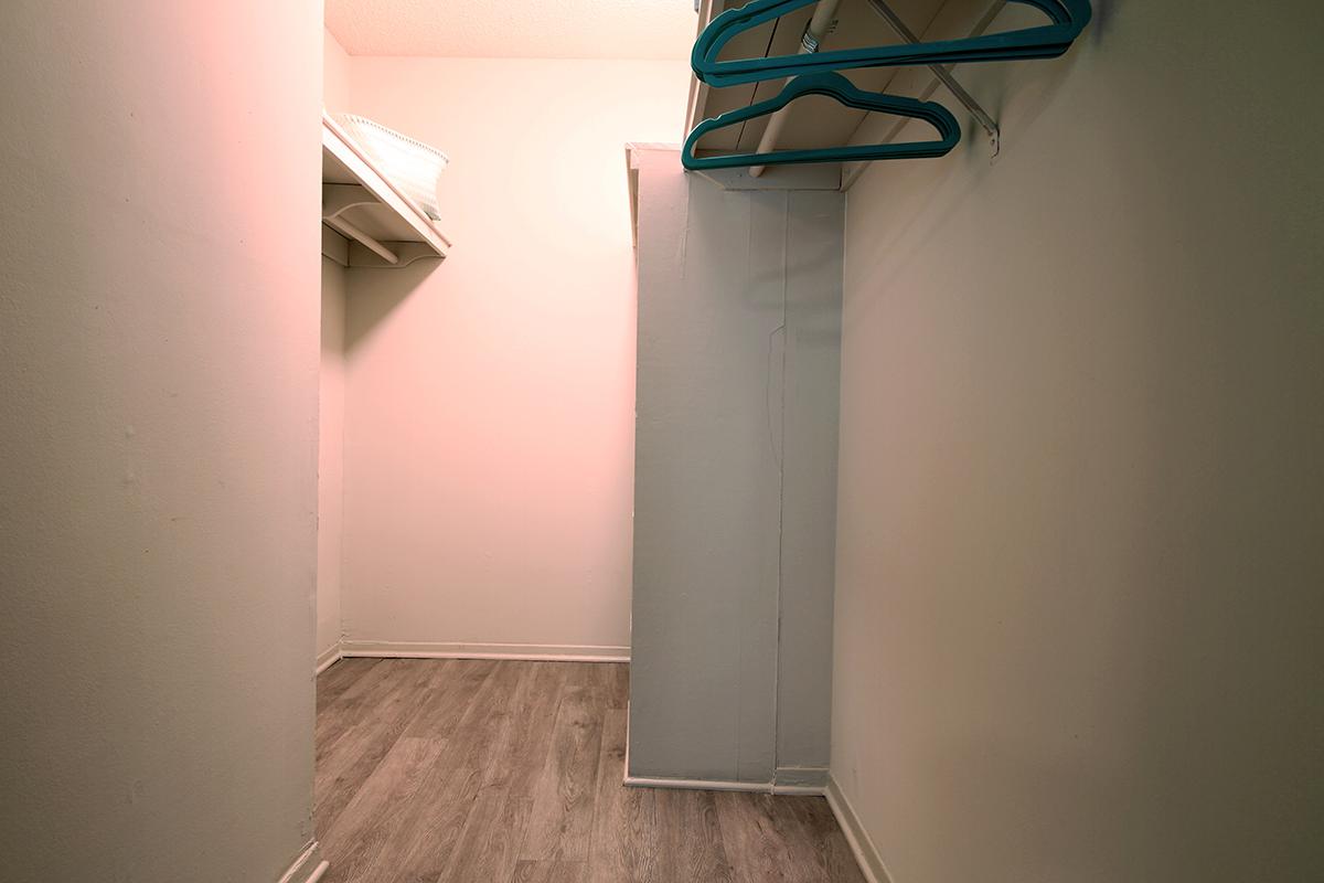 a white refrigerator freezer sitting inside of a building