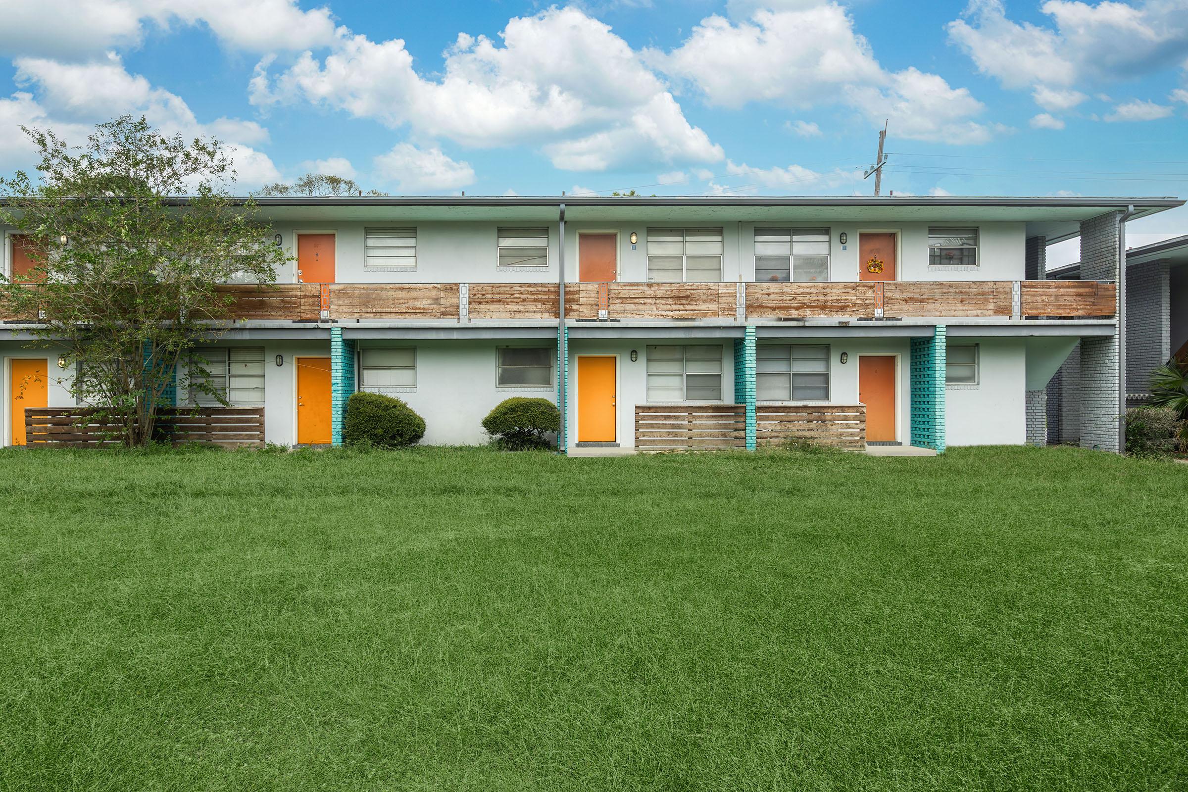 a large lawn in front of a house