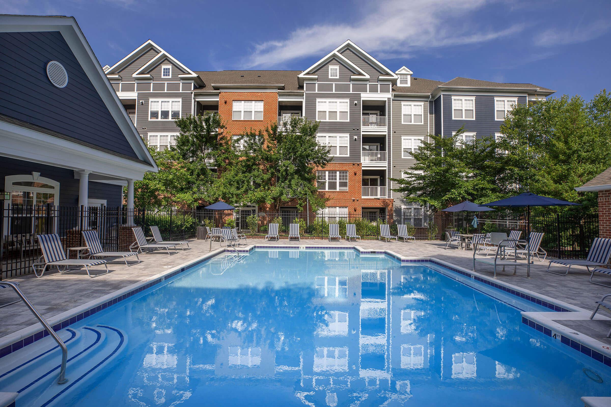 a pool next to a building