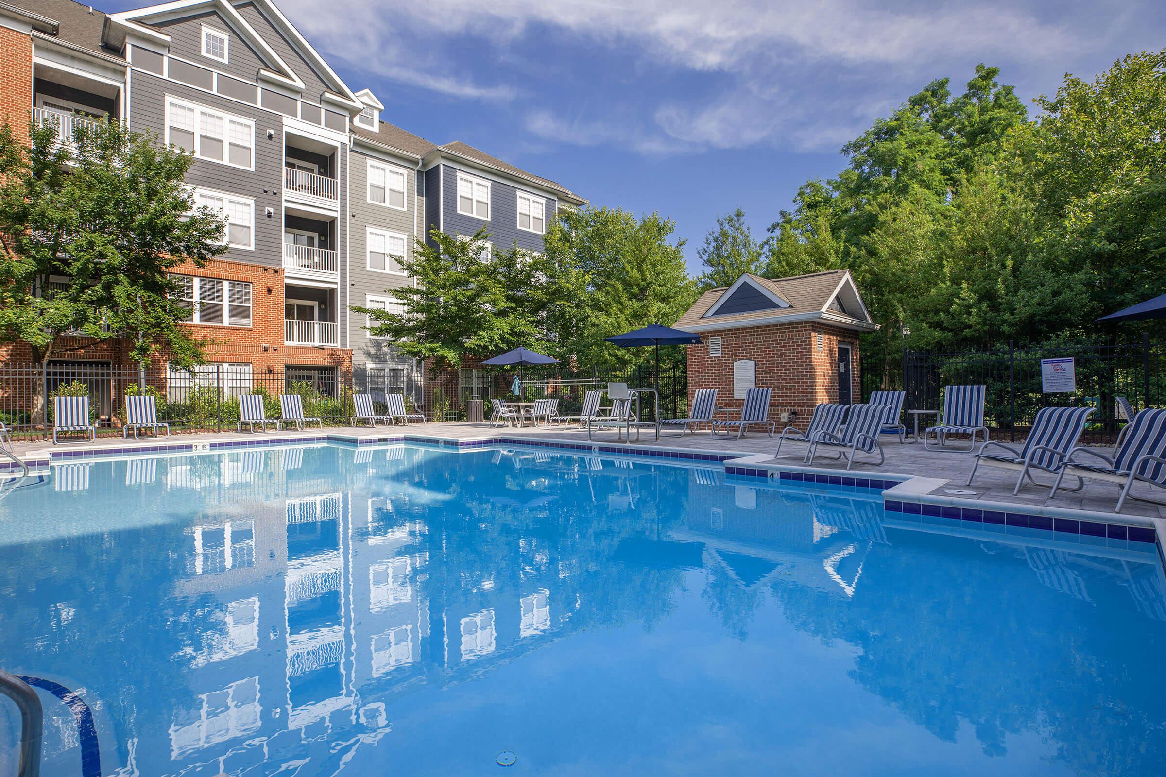 a pool next to a building