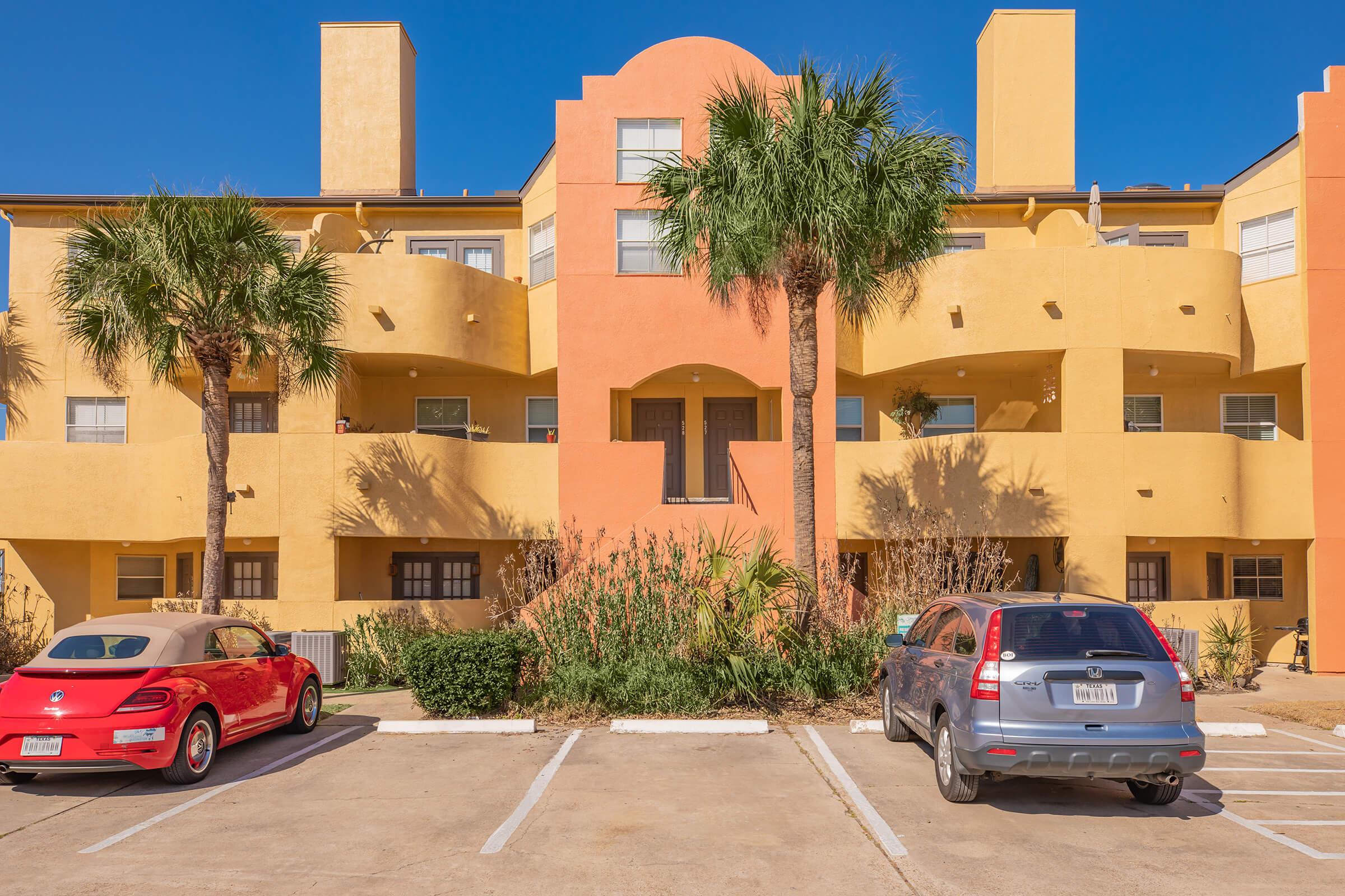 a car parked in front of a building