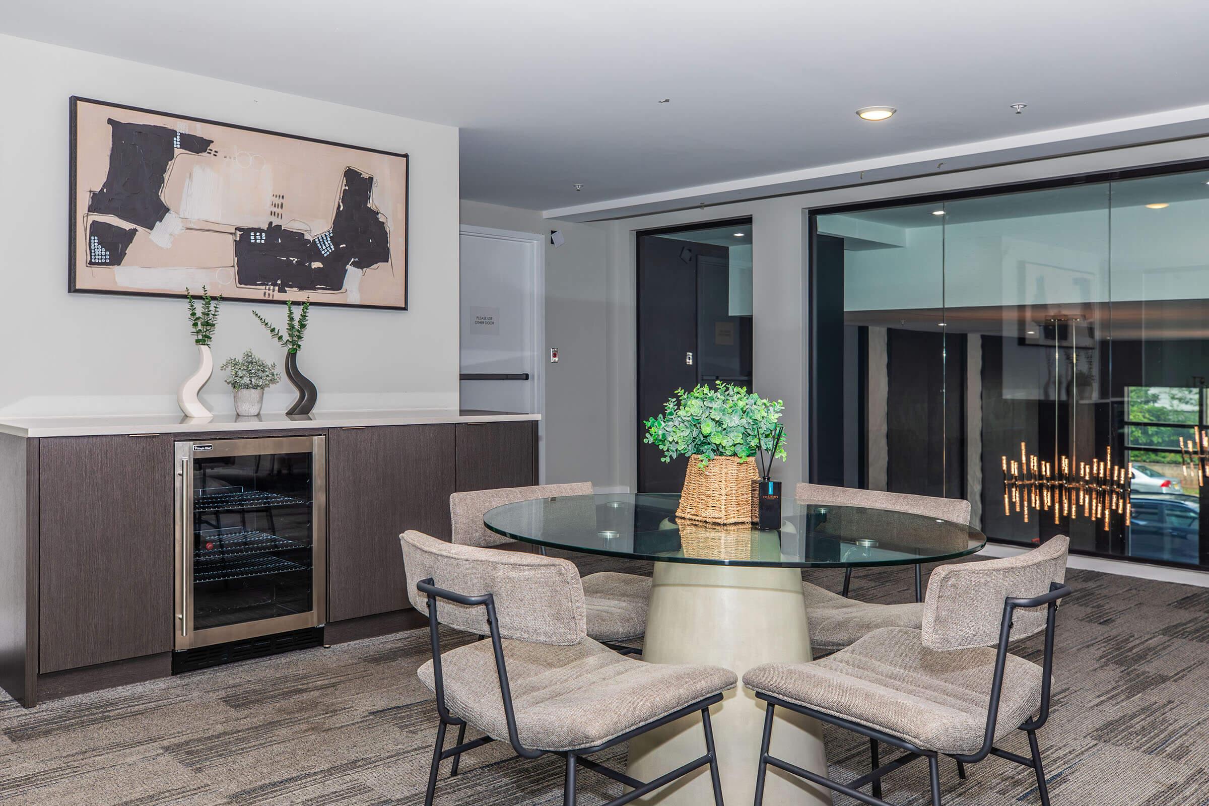 a living room filled with furniture and a flat screen tv