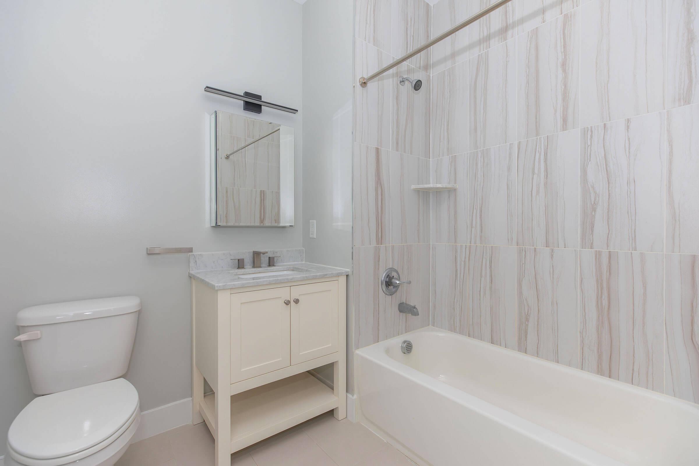 a close up of a sink and a bath tub