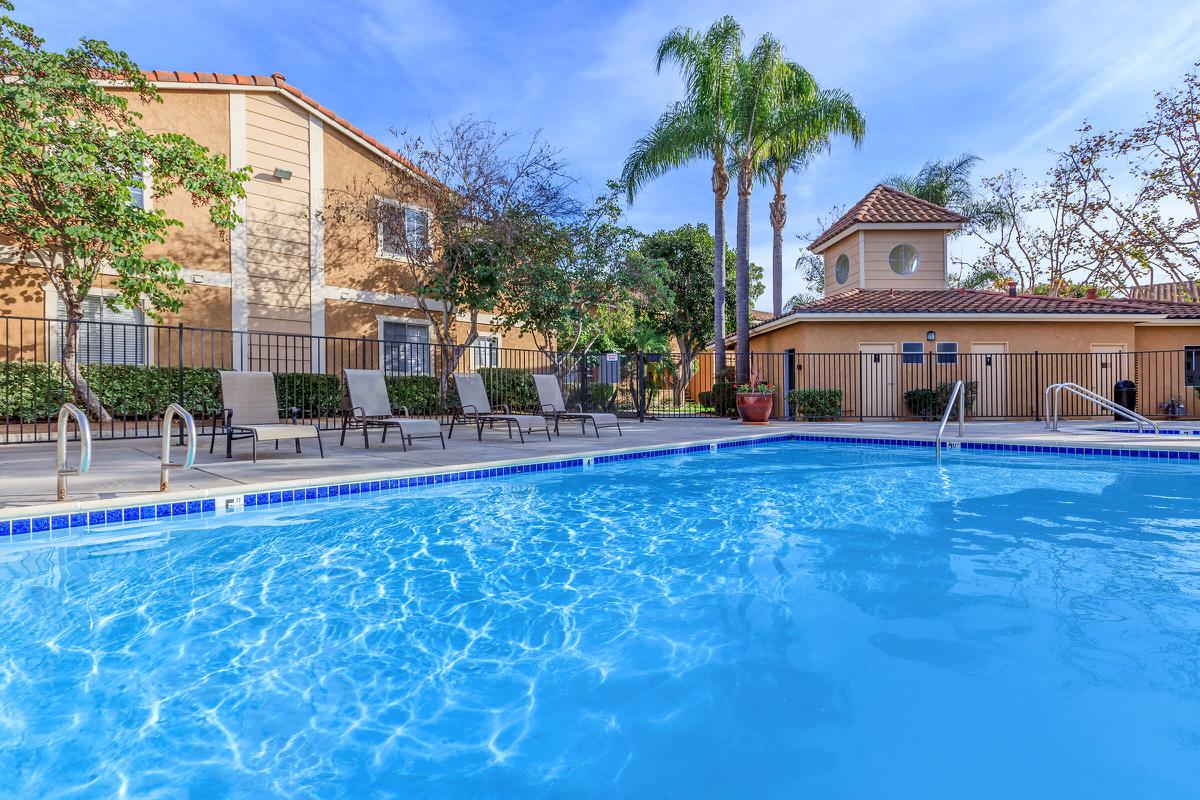 a house with a large pool of water
