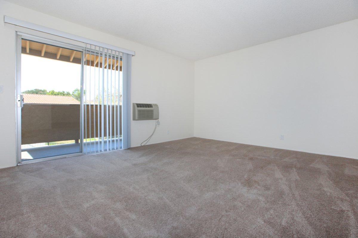 a bedroom with a bed in a room